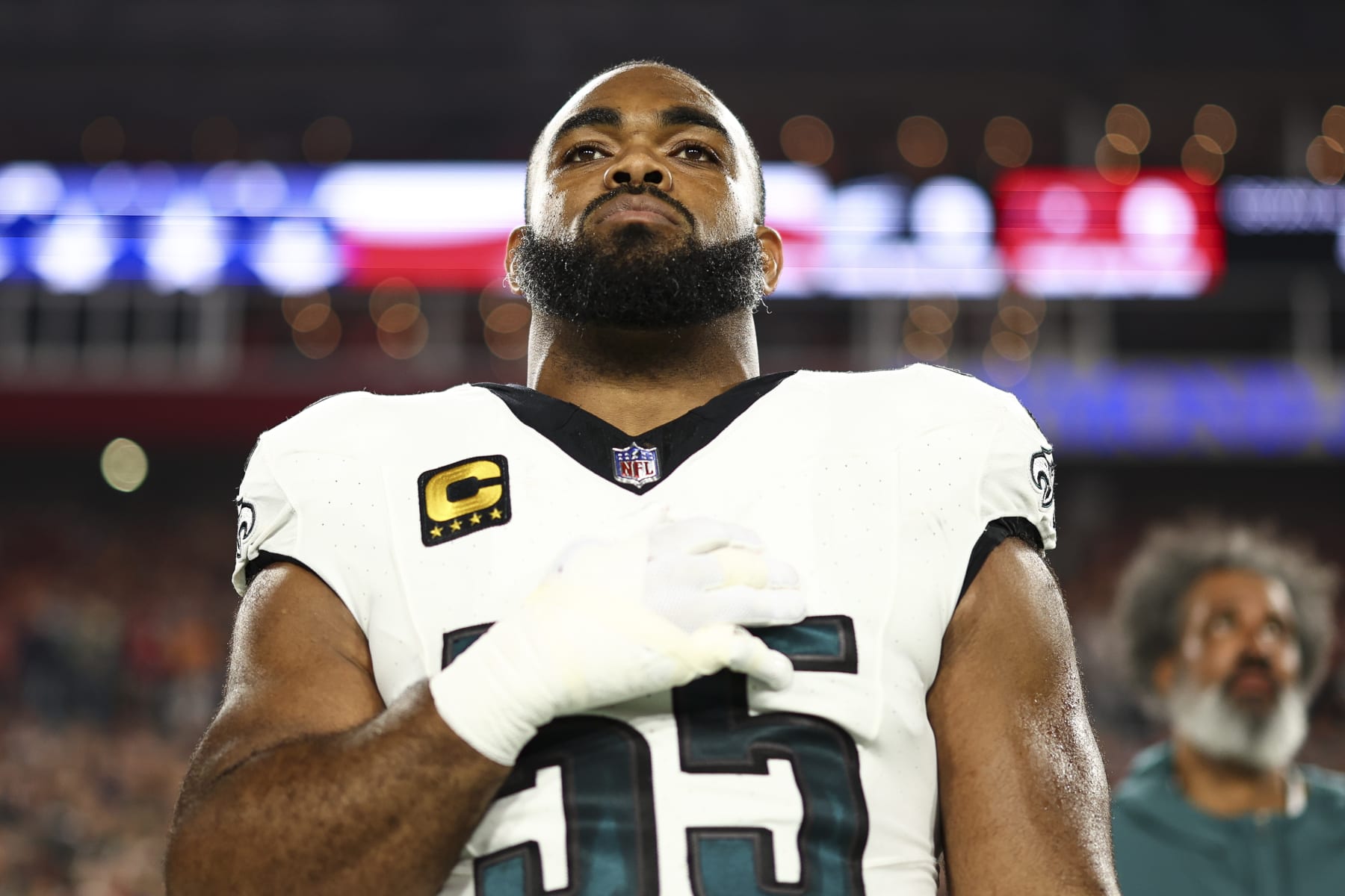 TAMPA, FL - JANUARY 15: Brandon Graham #55 of the Philadelphia Eagles stands on the sidelines during the national anthem prior to an NFL wild-card playoff football game against the Tampa Bay Buccaneers at Raymond James Stadium on January 15, 2024 in Tampa, Florida. (Photo by Kevin Sabitus/Getty Images) TAMPA, FL - JANUARY 15: Brandon Graham #55 of the Philadelphia Eagles stands on the sidelines during the national anthem prior to an NFL wild-card playoff football game against the Tampa Bay Buccaneers at Raymond James Stadium on January 15, 2024 in Tampa, Florida. (Photo by Kevin Sabitus/Getty Images)