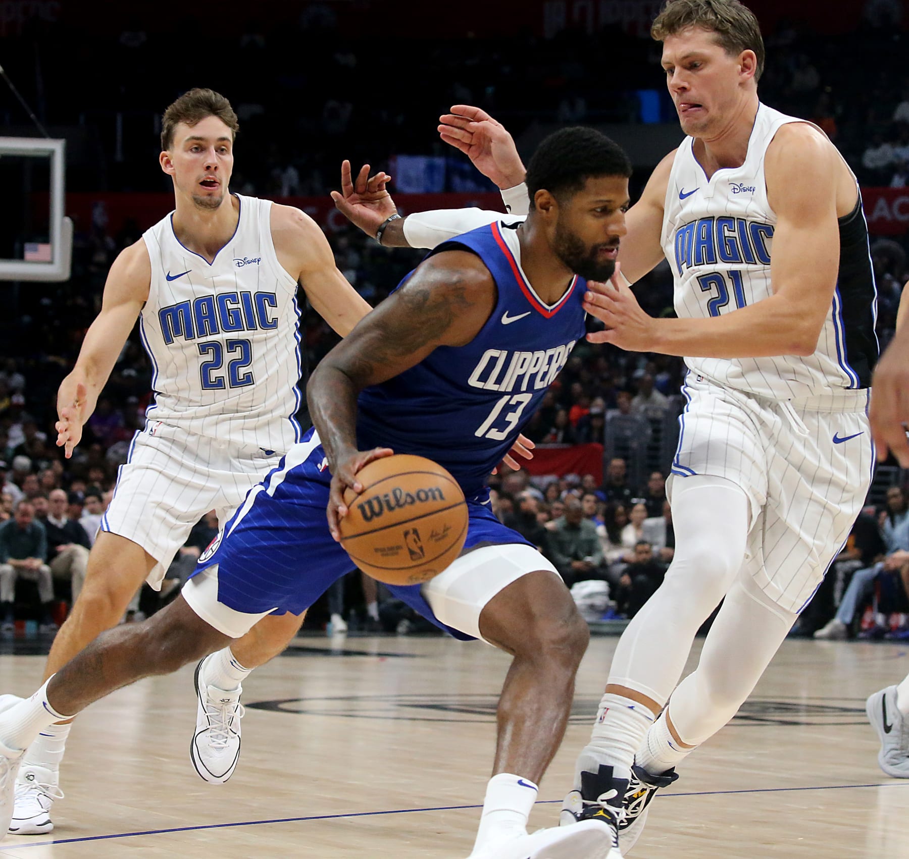 Franz Wagner, Paul George and Moritz Wagner