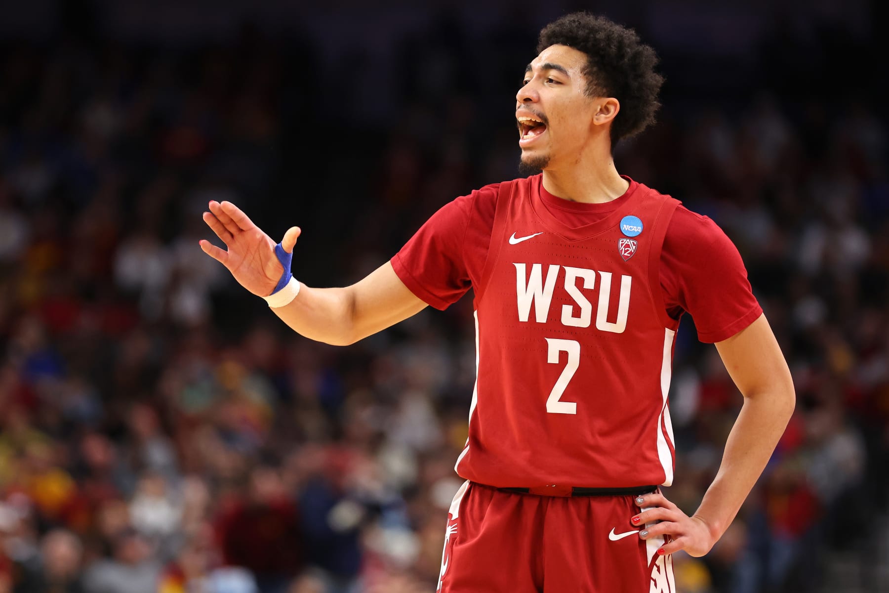 OMAHA, NEBRASKA - MARCH 23: Myles Rice #2 of the Washington State Cougars reacts during the first half against the Iowa State Cyclones in the second round of the NCAA Men's Basketball Tournament at CHI Health Center on March 23, 2024 in Omaha, Nebraska. (Photo by Michael Reaves/Getty Images)