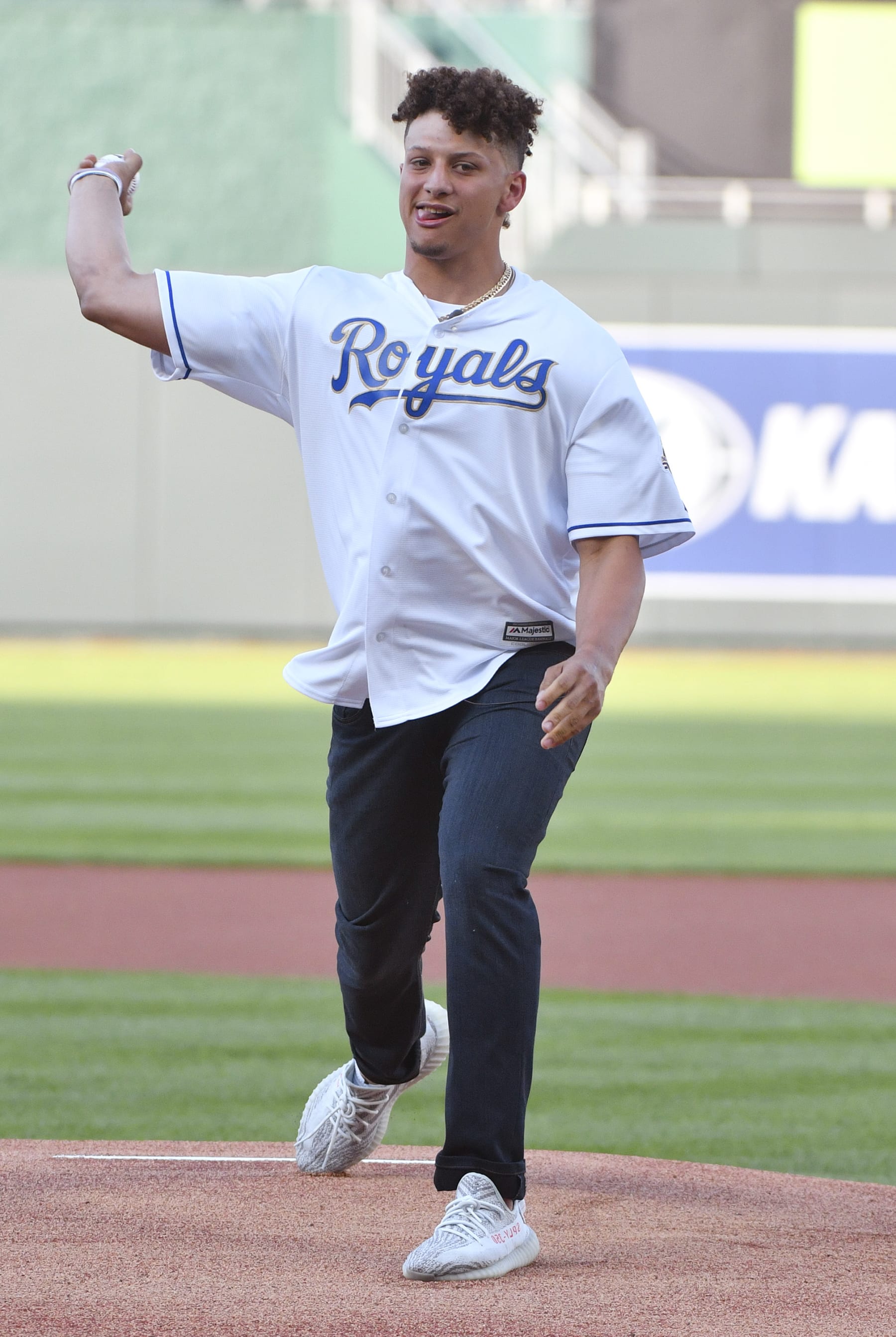 KANSAS CITY, MO - MAY 18: Quarterback Patrick Mahomes of the Kansas City Chiefs throws out the first pitch prior to a game between the New York Yankees and Kansas City Royals at Kauffman Stadium on May 18, 2018 in Kansas City, Missouri. (Photo by Ed Zurga/Getty Images)
