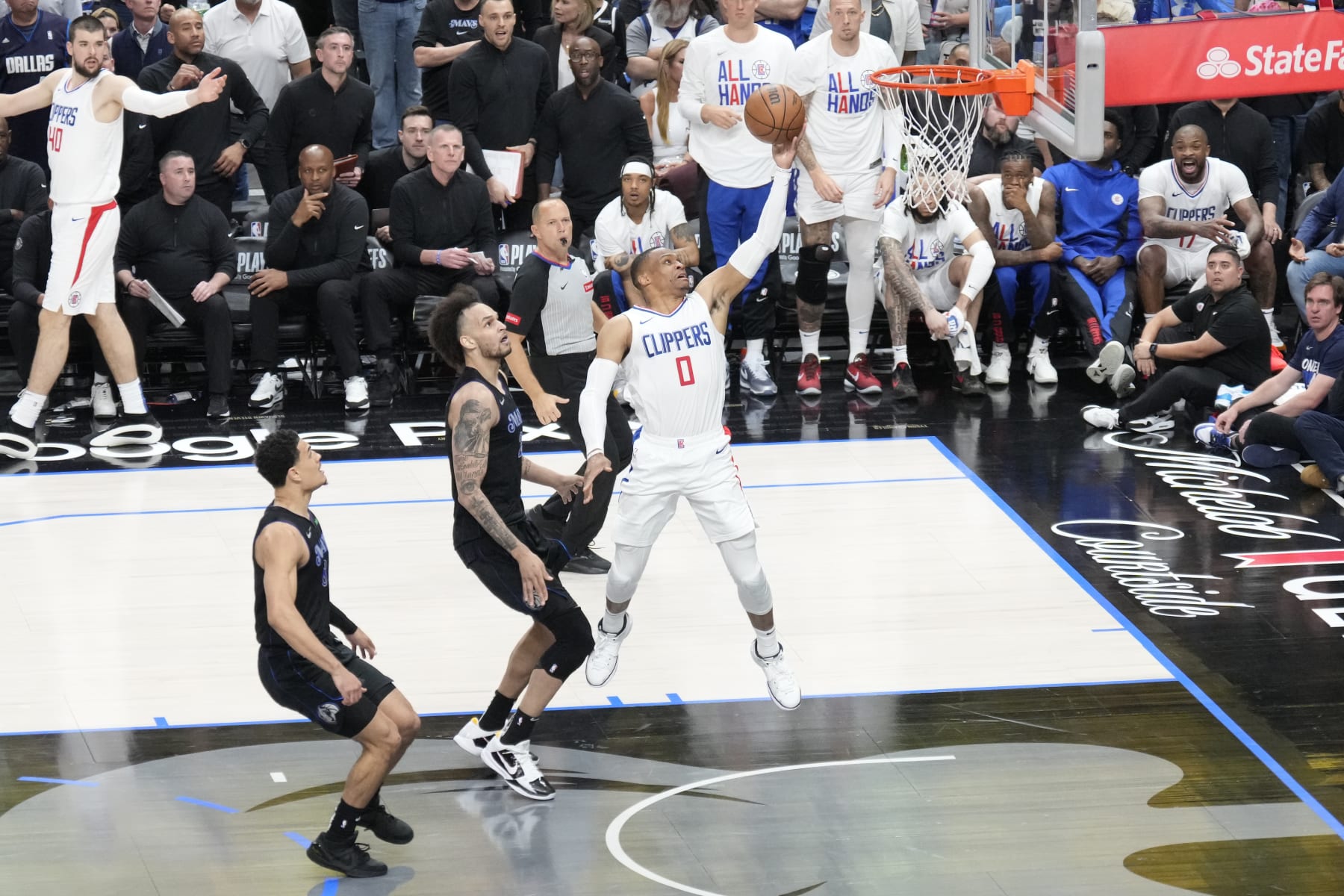 DALLAS, TX - MAY 3:  Russell Westbrook #0 of the LA Clippers drives to the basket during the game against the Dallas Mavericks during Round 1 Game 6 of the 2024 NBA Playoffs on May 3, 2024 at the American Airlines Center in Dallas, Texas. NOTE TO USER: User expressly acknowledges and agrees that, by downloading and or using this photograph, User is consenting to the terms and conditions of the Getty Images License Agreement. Mandatory Copyright Notice: Copyright 2024 NBAE (Photo by Jim Cowsert/NBAE via Getty Images)