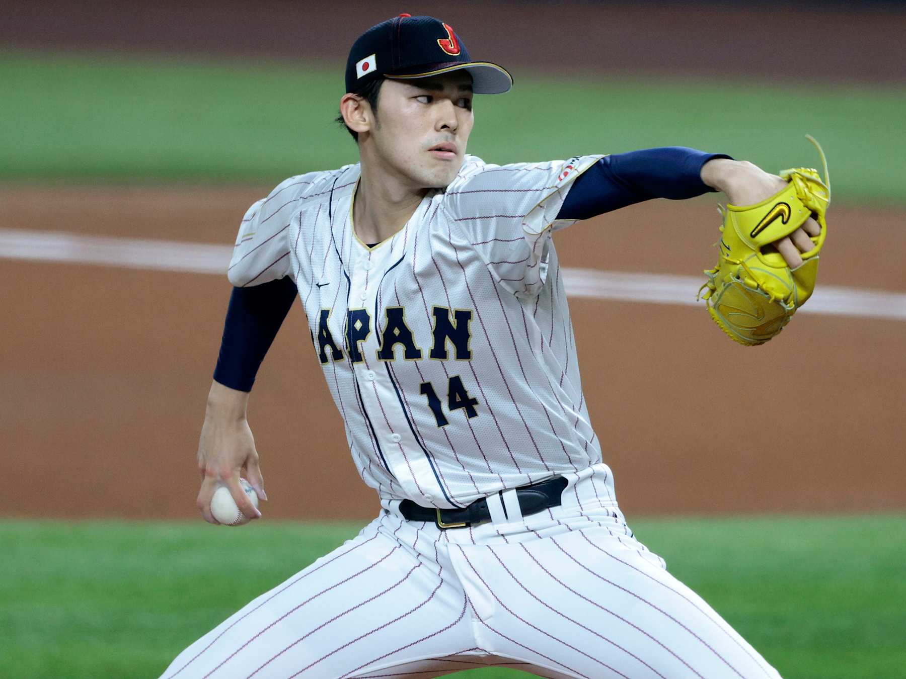 MIAMI, FL - MARCH 20: Roki Sasaki #14 of Team Japan pitches during the 2023 World Baseball Classic Semifinal game against Team Mexico at loanDepot Park on March 20, 2023 in Miami, Florida. (Photo by Christopher Pasatieri/Getty Images)
