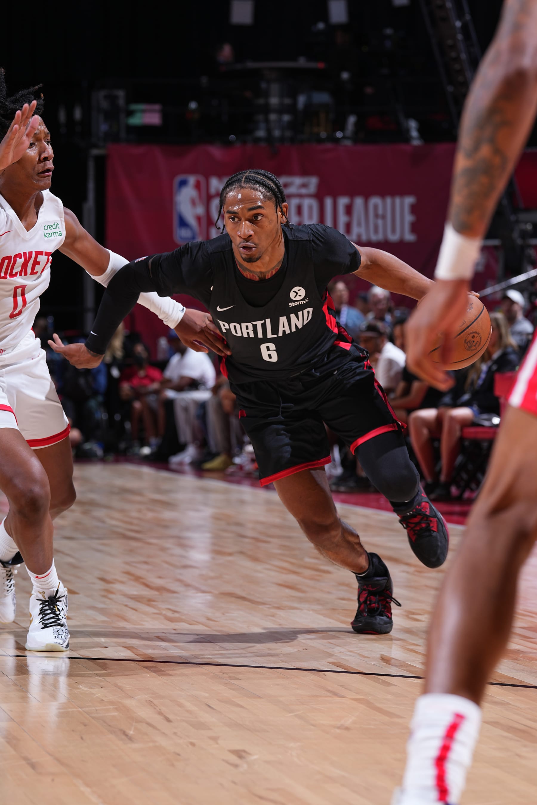 LAS VEGAS, NV - JULY 14: Keon Johnson #6 of the Portland Trail Blazers drives to the basket during the game against the Houston Rockets during the 2022 Las Vegas Summer League on July 14, 2022 at the Thomas & Mack Center in Las Vegas, Nevada NOTE TO USER: User expressly acknowledges and agrees that, by downloading and/or using this Photograph, user is consenting to the terms and conditions of the Getty Images License Agreement. Mandatory Copyright Notice: Copyright 2022 NBAE (Photo by Bart Young/NBAE via Getty Images)