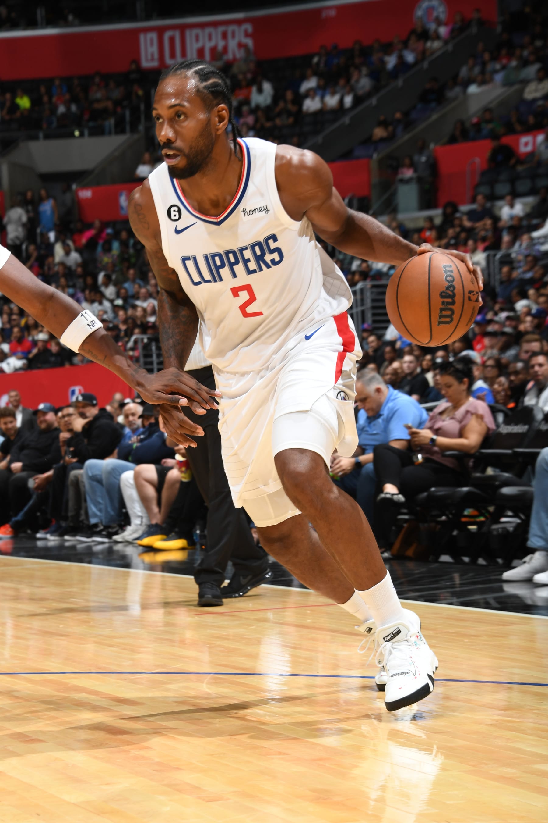 LOS ANGELES, CA - OCTOBER 9: Kawhi Leonard #2 of the LA Clippers dribbles the ball against the Minnesota Timberwolves during a preseason game on October 9, 2022 at Crypto.com Arena in Los Angeles, California. NOTE TO USER: User expressly acknowledges and agrees that, by downloading and/or using this Photograph, user is consenting to the terms and conditions of the Getty Images License Agreement. Mandatory Copyright Notice: Copyright 2022 NBAE (Photo by Andrew D. Bernstein/NBAE via Getty Images)