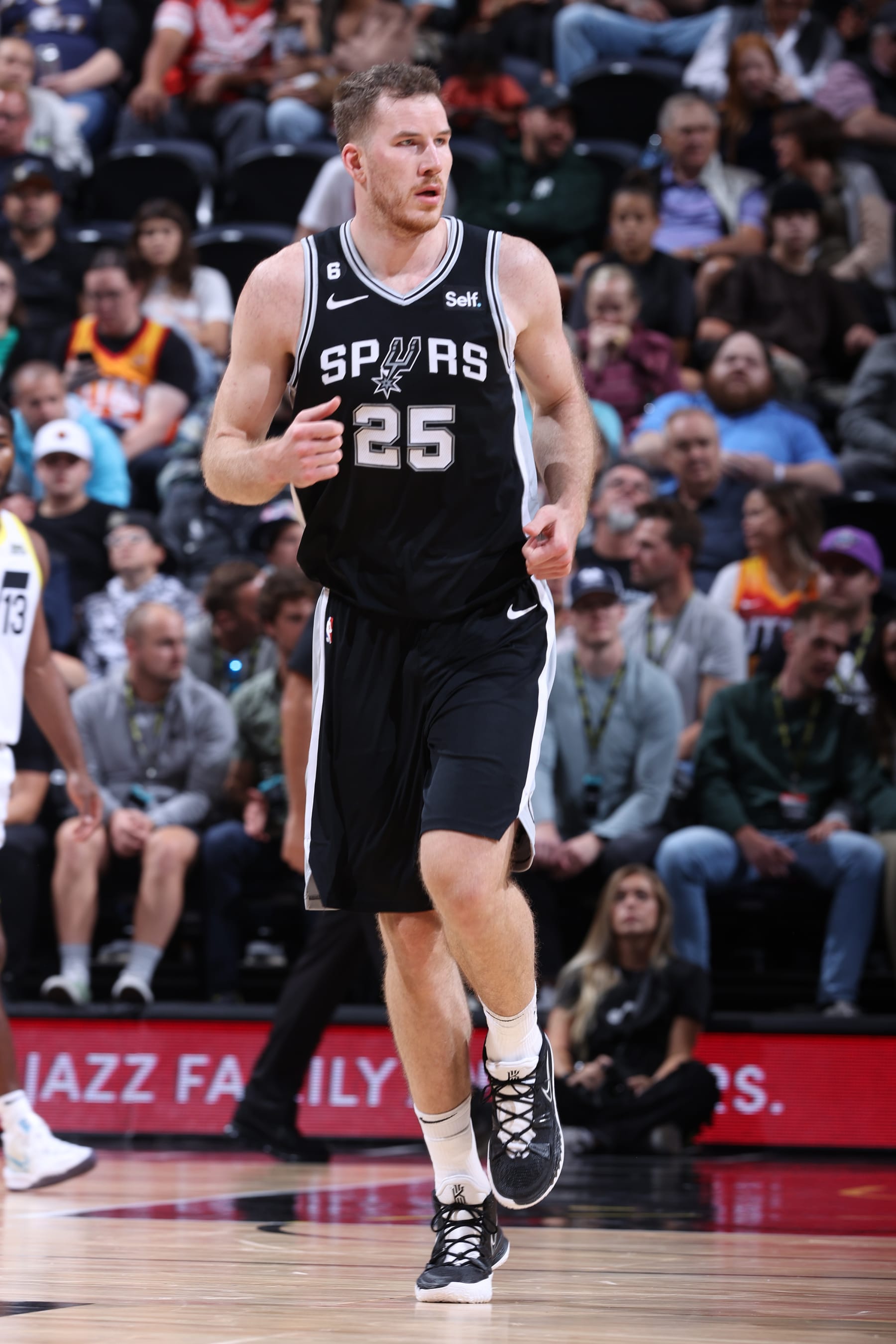SALT LAKE CITY, UT - OCTOBER 11: Jakob Poeltl #25 of the San Antonio Spurs looks on during the game against the Utah Jazz on October 11, 2022 at vivint.SmartHome Arena in Salt Lake City, Utah. NOTE TO USER: User expressly acknowledges and agrees that, by downloading and or using this Photograph, User is consenting to the terms and conditions of the Getty Images License Agreement. Mandatory Copyright Notice: Copyright 2022 NBAE (Photo by Melissa Majchrzak/NBAE via Getty Images)