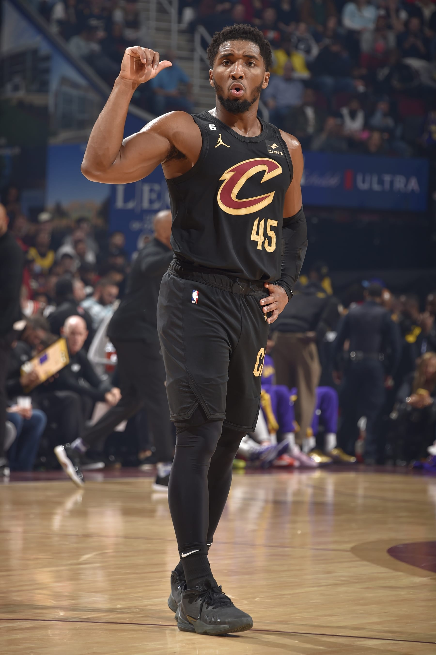 CLEVELAND, OH - DECEMBER 6: Donovan Mitchell #45 of the Cleveland Cavaliers looks on during the game against the Los Angeles Lakers on December 6, 2022 at Rocket Mortgage FieldHouse in Cleveland, Ohio. NOTE TO USER: User expressly acknowledges and agrees that, by downloading and/or using this Photograph, user is consenting to the terms and conditions of the Getty Images License Agreement. Mandatory Copyright Notice: Copyright 2022 NBAE (Photo by David Liam Kyle/NBAE via Getty Images)