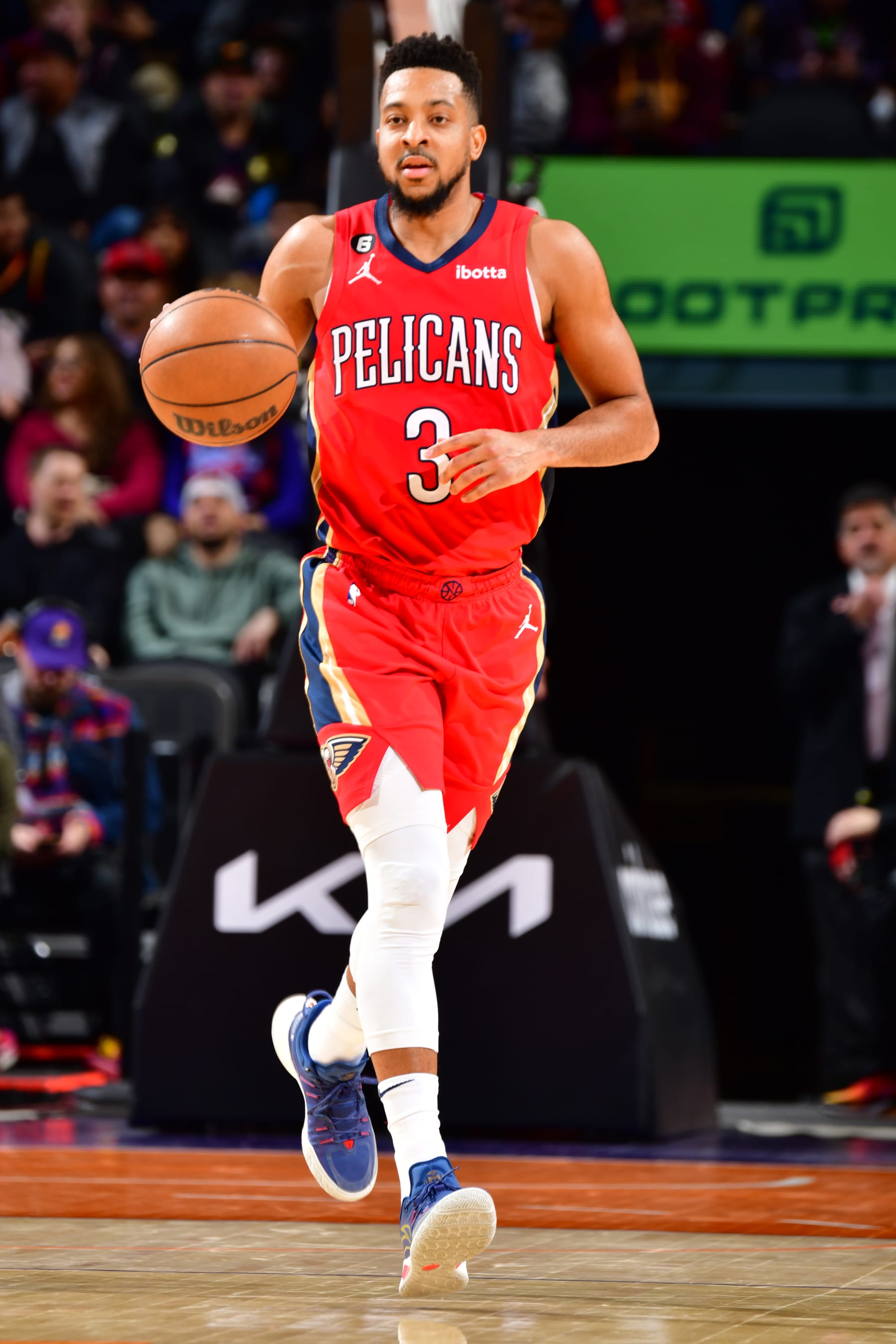 PHOENIX, AZ - DECEMBER 17:  CJ McCollum #3 of the New Orleans Pelicans handles the ball during the game against the Phoenix Suns  on December 17, 2022 at Footprint Center in Phoenix, Arizona. NOTE TO USER: User expressly acknowledges and agrees that, by downloading and or using this photograph, user is consenting to the terms and conditions of the Getty Images License Agreement. Mandatory Copyright Notice: Copyright 2022 NBAE (Photo by Barry Gossage/NBAE via Getty Images)