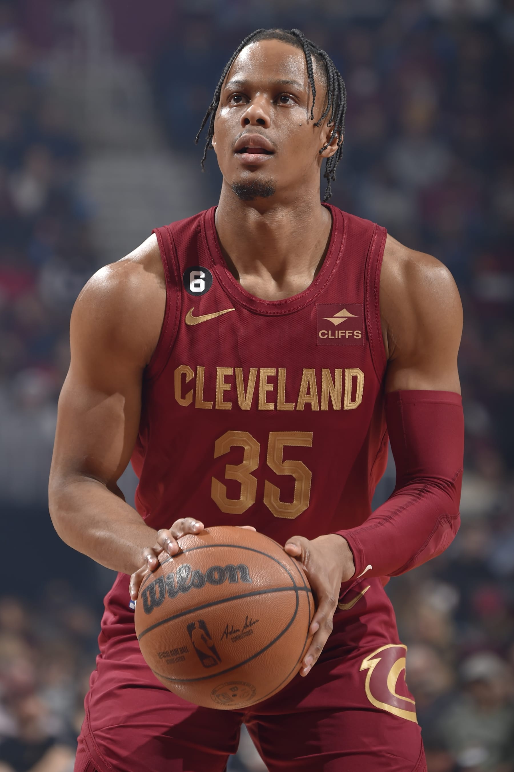 CLEVELAND, OH - MARCH 26: Isaac Okoro #35 of the Cleveland Cavaliers shoots a free throw during the game against the Houston Rockets on March 26, 2023 at Rocket Mortgage FieldHouse in Cleveland, Ohio. NOTE TO USER: User expressly acknowledges and agrees that, by downloading and/or using this Photograph, user is consenting to the terms and conditions of the Getty Images License Agreement. Mandatory Copyright Notice: Copyright 2023 NBAE (Photo by David Liam Kyle/NBAE via Getty Images)