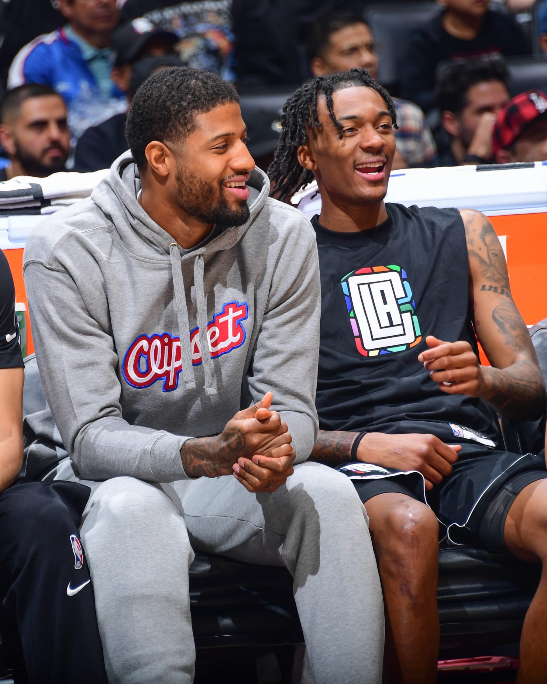 LOS ANGELES, CA - APRIL 8:  Bones Hyland #5 and Paul George #13 of the LA Clippers sit courtside during the game on April 8, 2023 at Crypto.Com Arena in Los Angeles, California. NOTE TO USER: User expressly acknowledges and agrees that, by downloading and/or using this Photograph, user is consenting to the terms and conditions of the Getty Images License Agreement. Mandatory Copyright Notice: Copyright 2023 NBAE (Photo by Adam Pantozzi/NBAE via Getty Images)