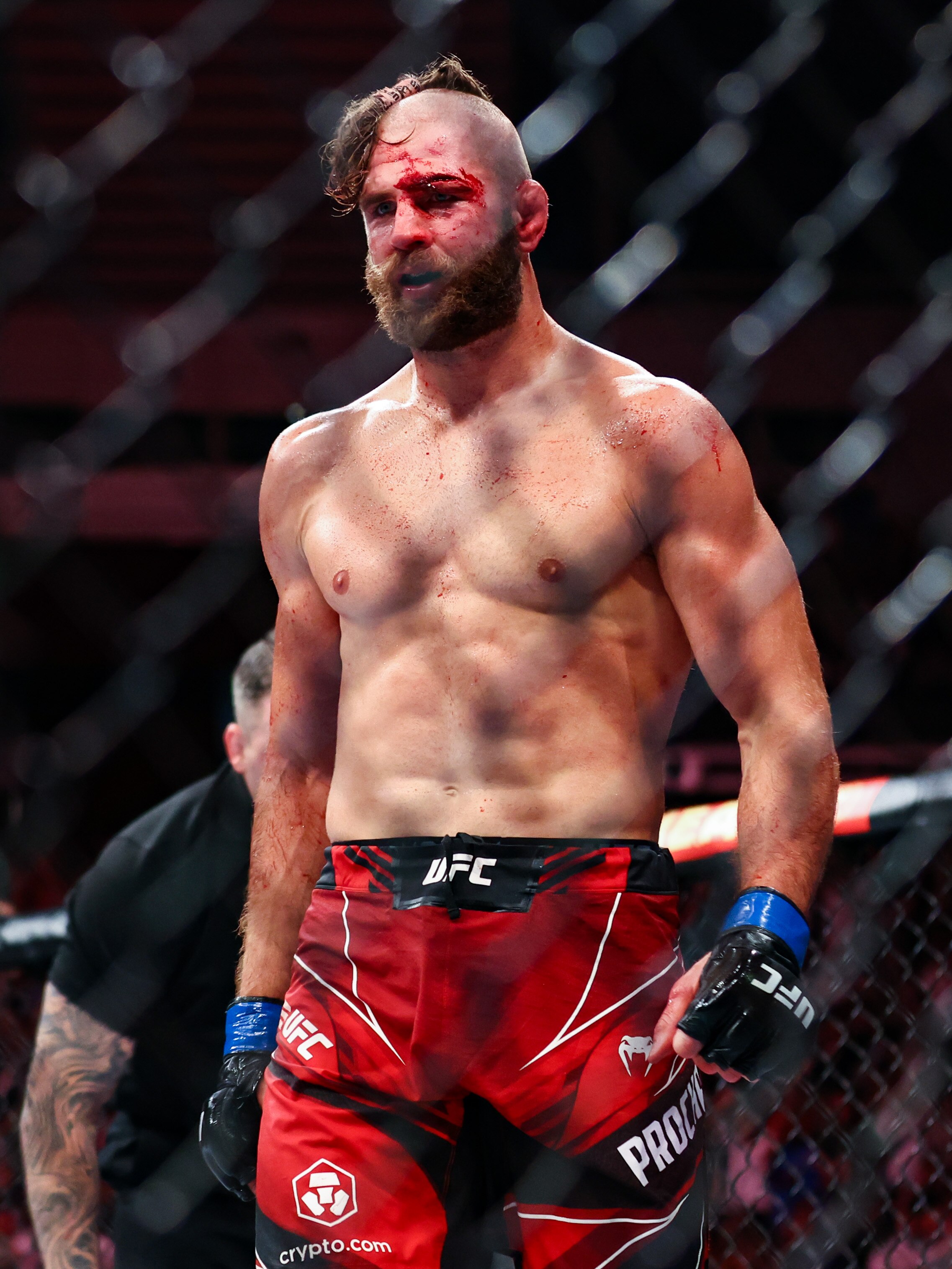 SINGAPORE, SINGAPORE - JUNE 12: Jiri Prochazka of Czech Republic celebrates defeating Glover Teixeira of Brazil in the UFC light heavyweight championship fight at Singapore Indoor Stadium on June 12, 2022 in Singapore. (Photo by Yong Teck Lim/Getty Images)