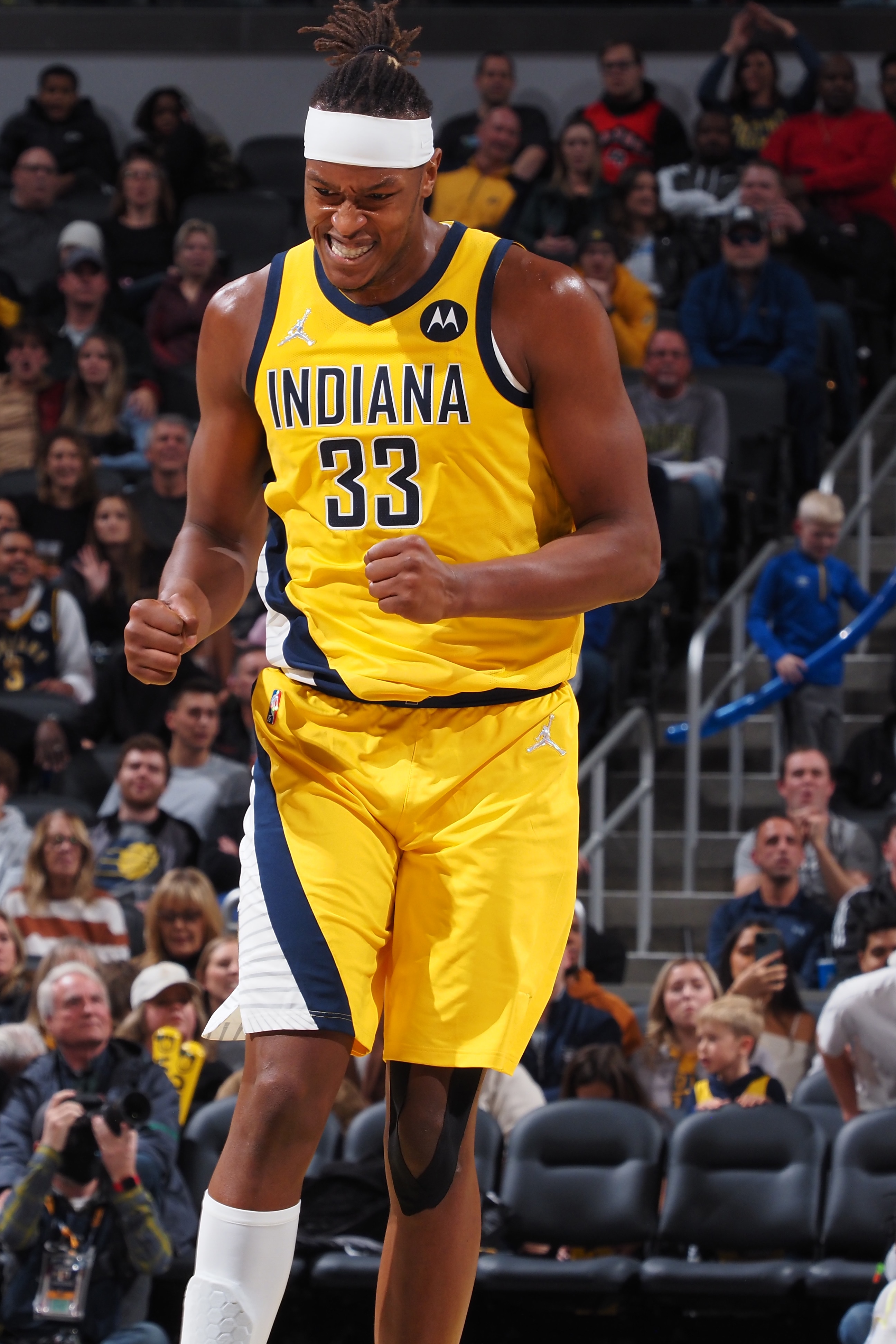 INDIANAPOLIS, IN - NOVEMBER 26: Myles Turner #33 of the Indiana Pacers celebrates during the game against the Toronto Raptors on November 26, 2021 at Gainbridge Fieldhouse in Indianapolis, Indiana. NOTE TO USER: User expressly acknowledges and agrees that, by downloading and or using this Photograph, user is consenting to the terms and conditions of the Getty Images License Agreement. Mandatory Copyright Notice: Copyright 2021 NBAE (Photo by Ron Hoskins/NBAE via Getty Images)