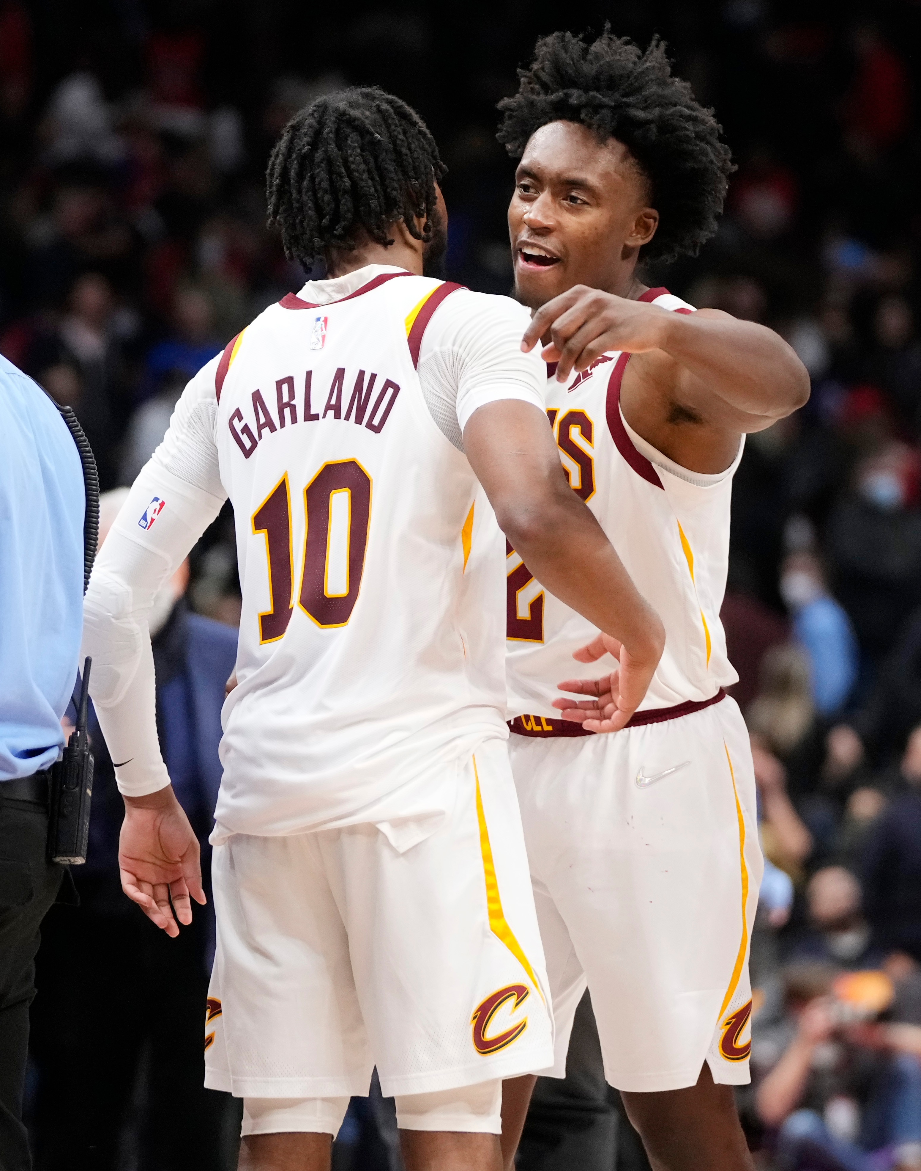 TORONTO, ON - NOVEMBER 5: Collin Sexton #2 and Darius Garland #10 of the Cleveland Cavaliers celebrate defeating the Toronto Raptors in their basketball game at the Scotiabank Arena on November 5, 2021 in Toronto, Ontario, Canada. NOTE TO USER: User expressly acknowledges and agrees that, by downloading and/or using this Photograph, user is consenting to the terms and conditions of the Getty Images License Agreement. (Photo by Mark Blinch/Getty Images)