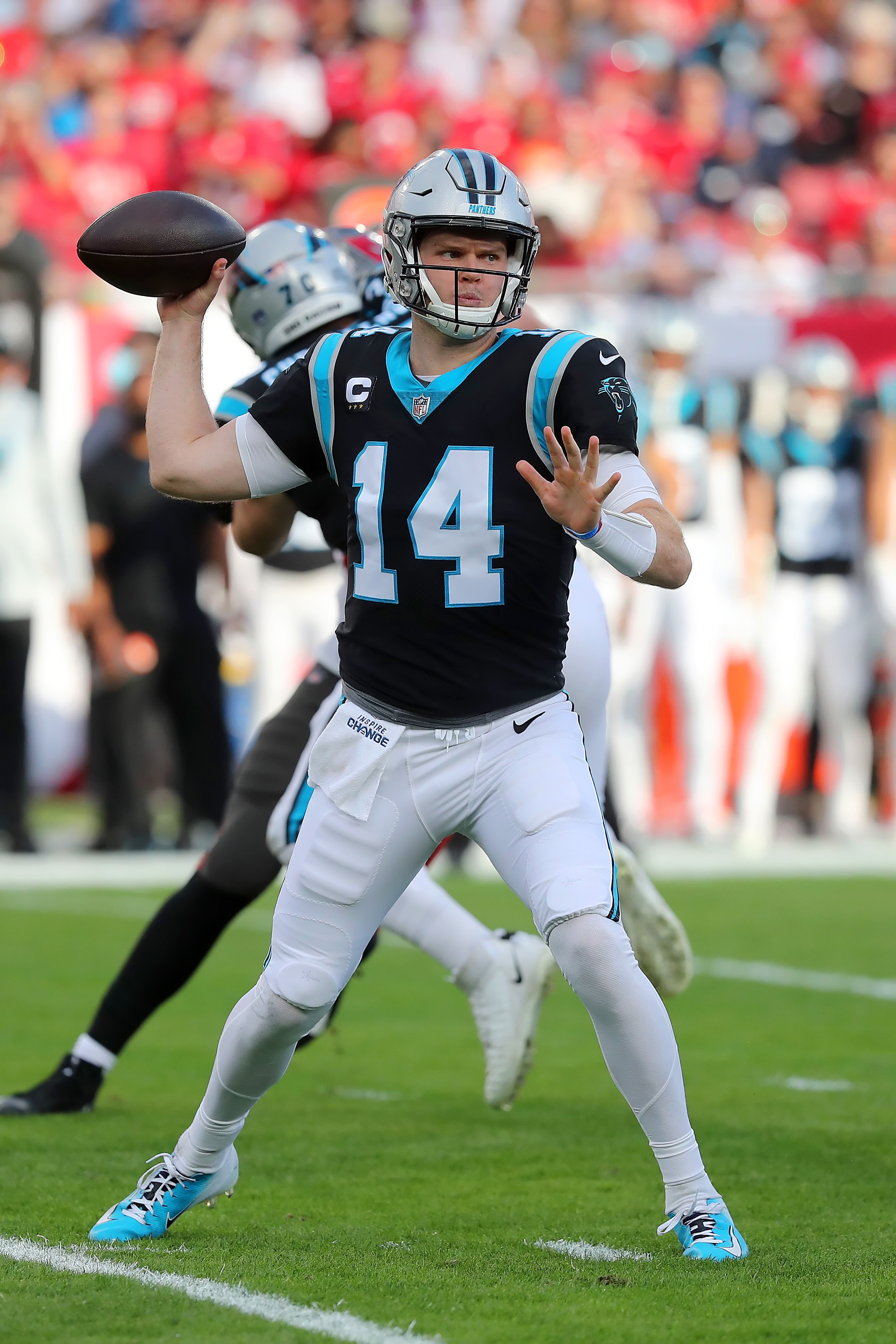 TAMPA, FL - JANUARY 9: Carolina Panthers Quarterback Sam Darnold (14) throws a pass during the regular season game between the Carolina Panthers and the Tampa Bay Buccaneers on January 9, 2022 at Raymond James Stadium in Tampa, Florida. (Photo by Cliff Welch/Icon Sportswire via Getty Images)