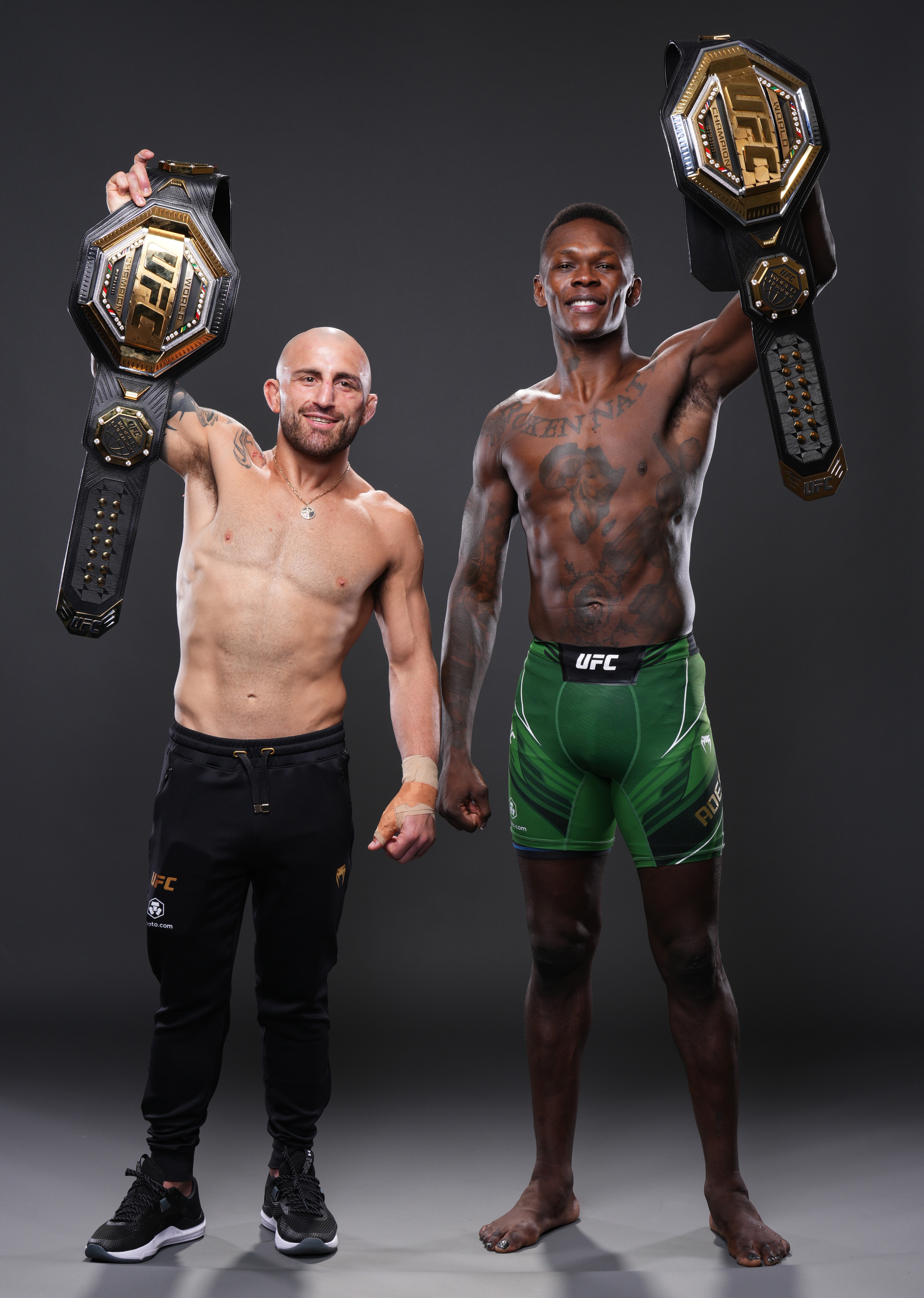 LAS VEGAS, NEVADA - JULY 02: Israel Adesanya of Nigeria and Alexander Volkanovski of Australia pose for a portrait after their victorys during the UFC 276 event at T-Mobile Arena on July 02, 2022 in Las Vegas, Nevada. (Photo by Mike Roach/Zuffa LLC)
