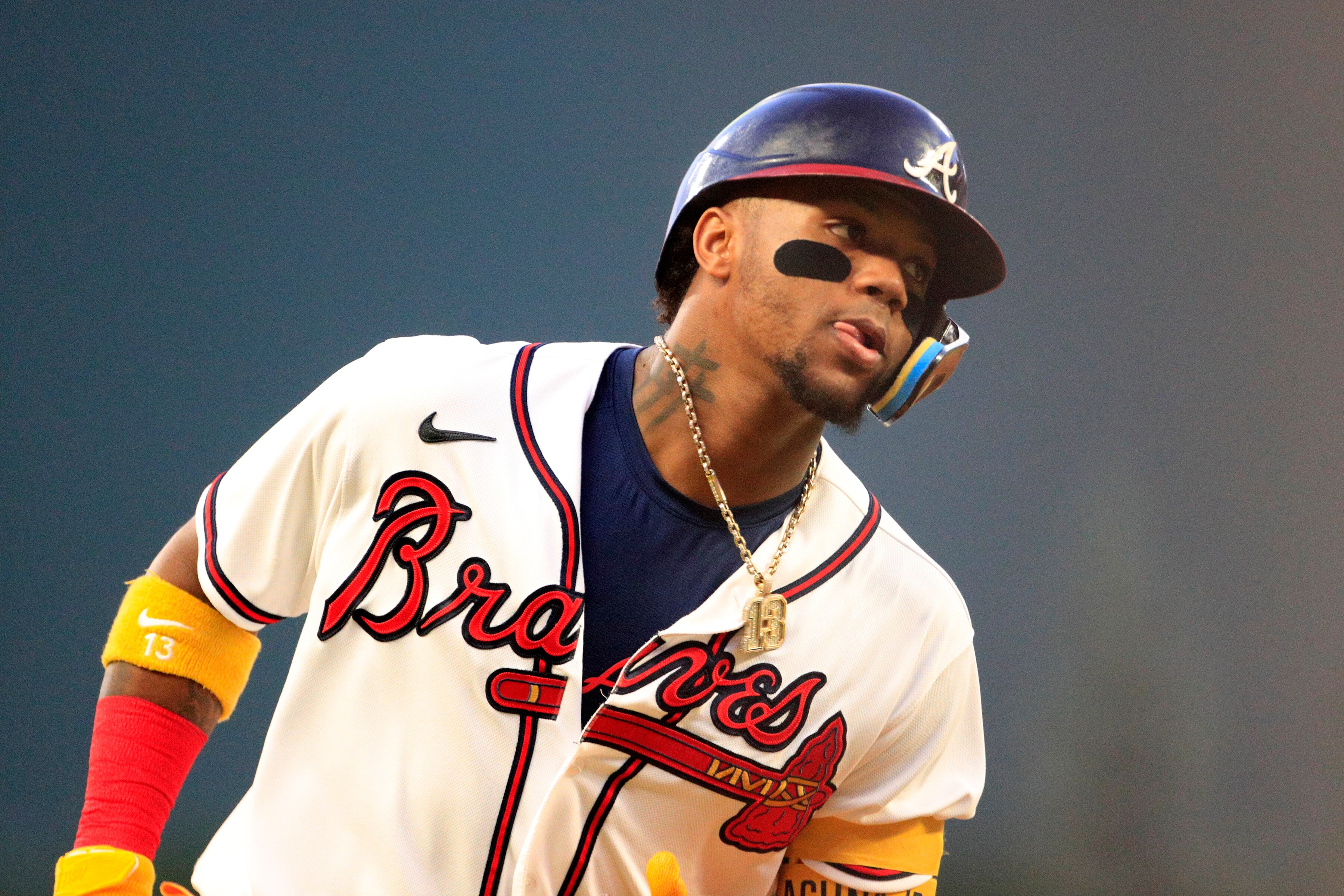 ATLANTA, GA - JUNE 21: Ronald Acuna, Jr. #13 right fielder of the Atlanta Braves reacts after hitting a home run during the MLB game between the Atlanta Braves and the San Francisco Giants on June 21, 2022 at Truist Park in Atlanta, GA. (Photo by Jeff Robinson/Icon Sportswire via Getty Images)
