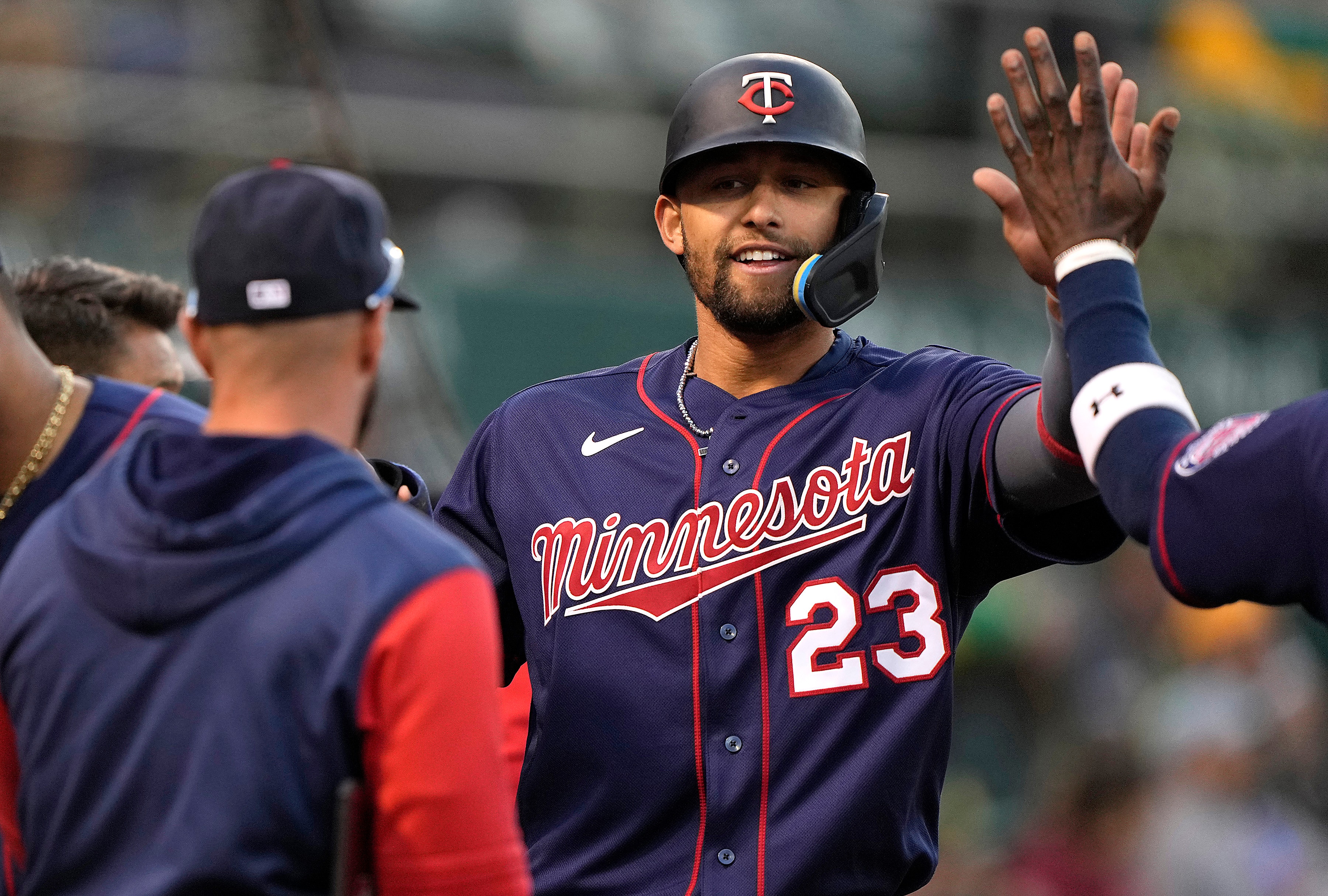 OAKLAND, CALIFORNIA - MAY 16: Royce Lewis #23 of the Minnesota Twins is congratulated by teammates after he scored against the Oakland Athletics in the top of the fifth inning at RingCentral Coliseum on May 16, 2022 in Oakland, California. (Photo by Thearon W. Henderson/Getty Images)