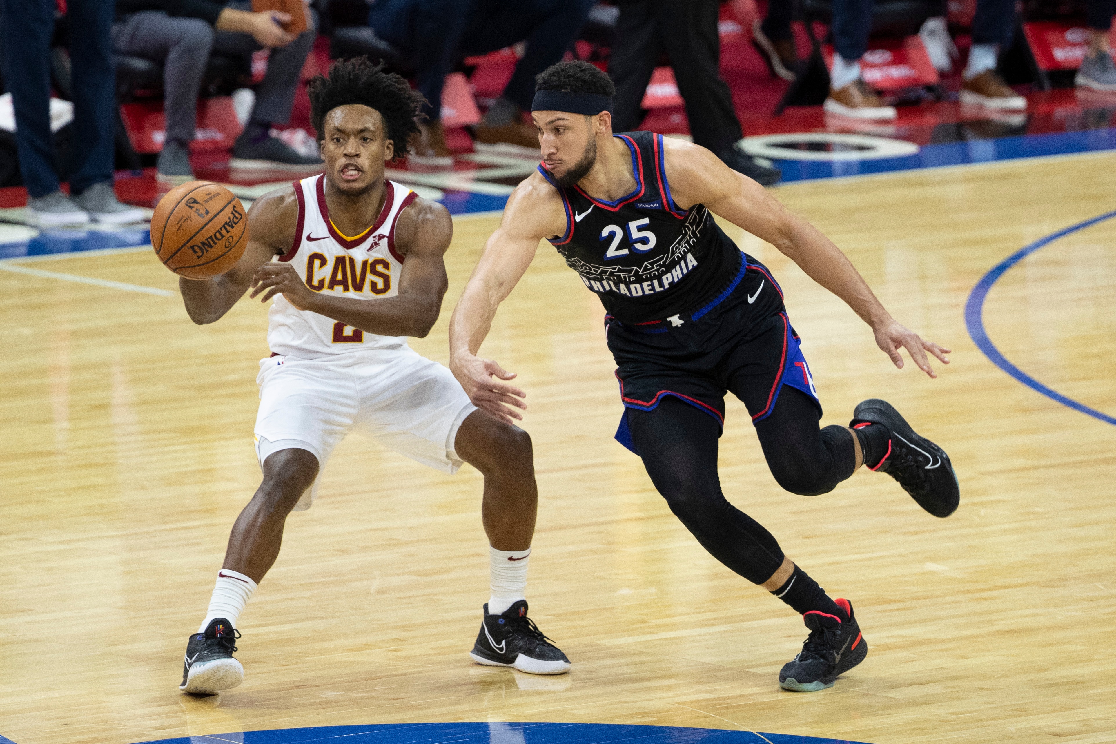 PHILADELPHIA, PA - FEBRUARY 27: Ben Simmons #25 of the Philadelphia 76ers steals the ball from Collin Sexton #2 of the Cleveland Cavaliers at Wells Fargo Center on February 27, 2021 in Philadelphia, Pennsylvania. NOTE TO USER: User expressly acknowledges and agrees that, by downloading and or using this photograph, User is consenting to the terms and conditions of the Getty Images License Agreement. (Photo by Mitchell Leff/Getty Images)