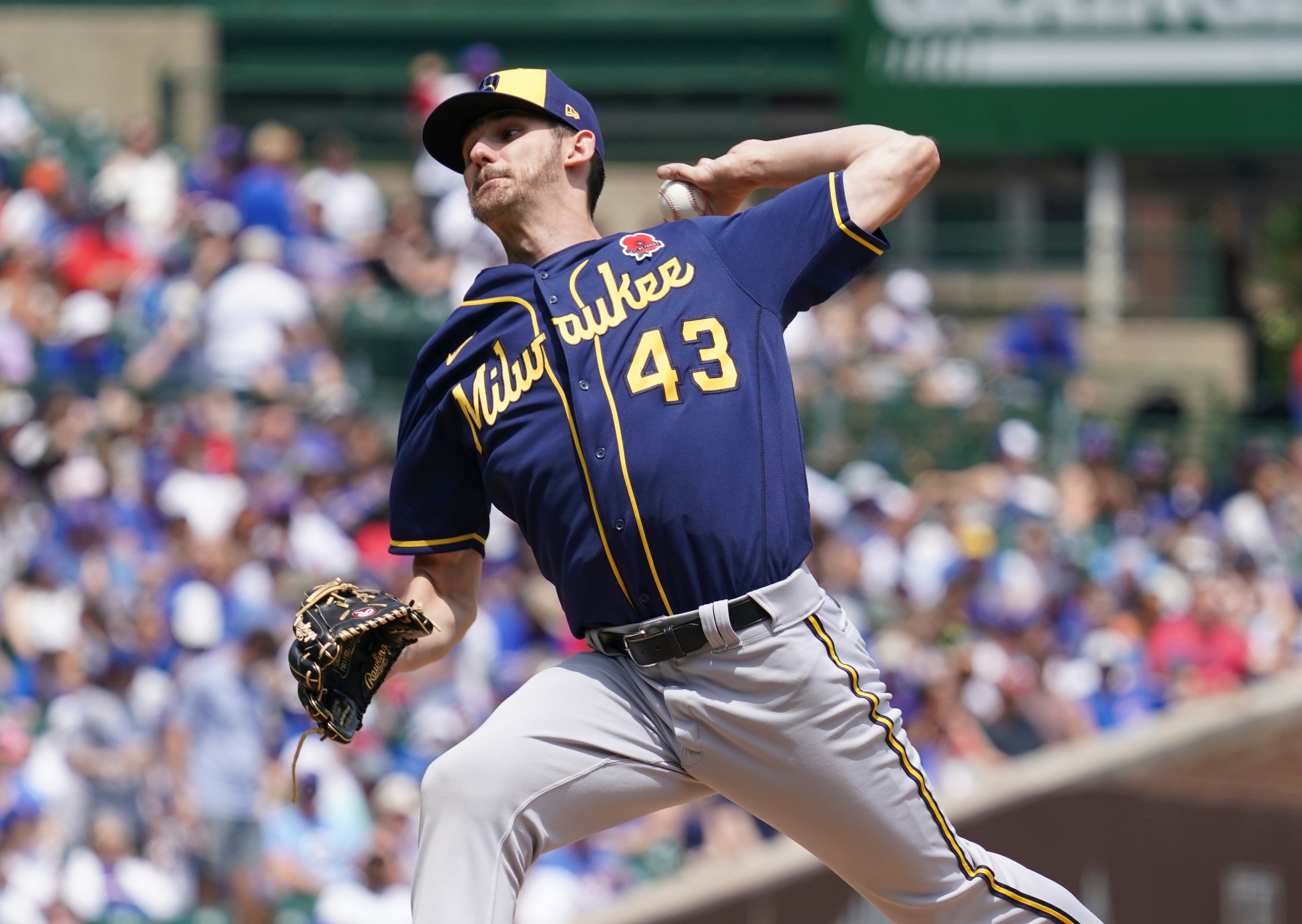 CHICAGO, ILLINOIS - MAY 30: Ethan Small #43 of the Milwaukee Brewers throws a pitch against the Chicago Cubs at Wrigley Field on May 30, 2022 in Chicago, Illinois. (Photo by Nuccio DiNuzzo/Getty Images)