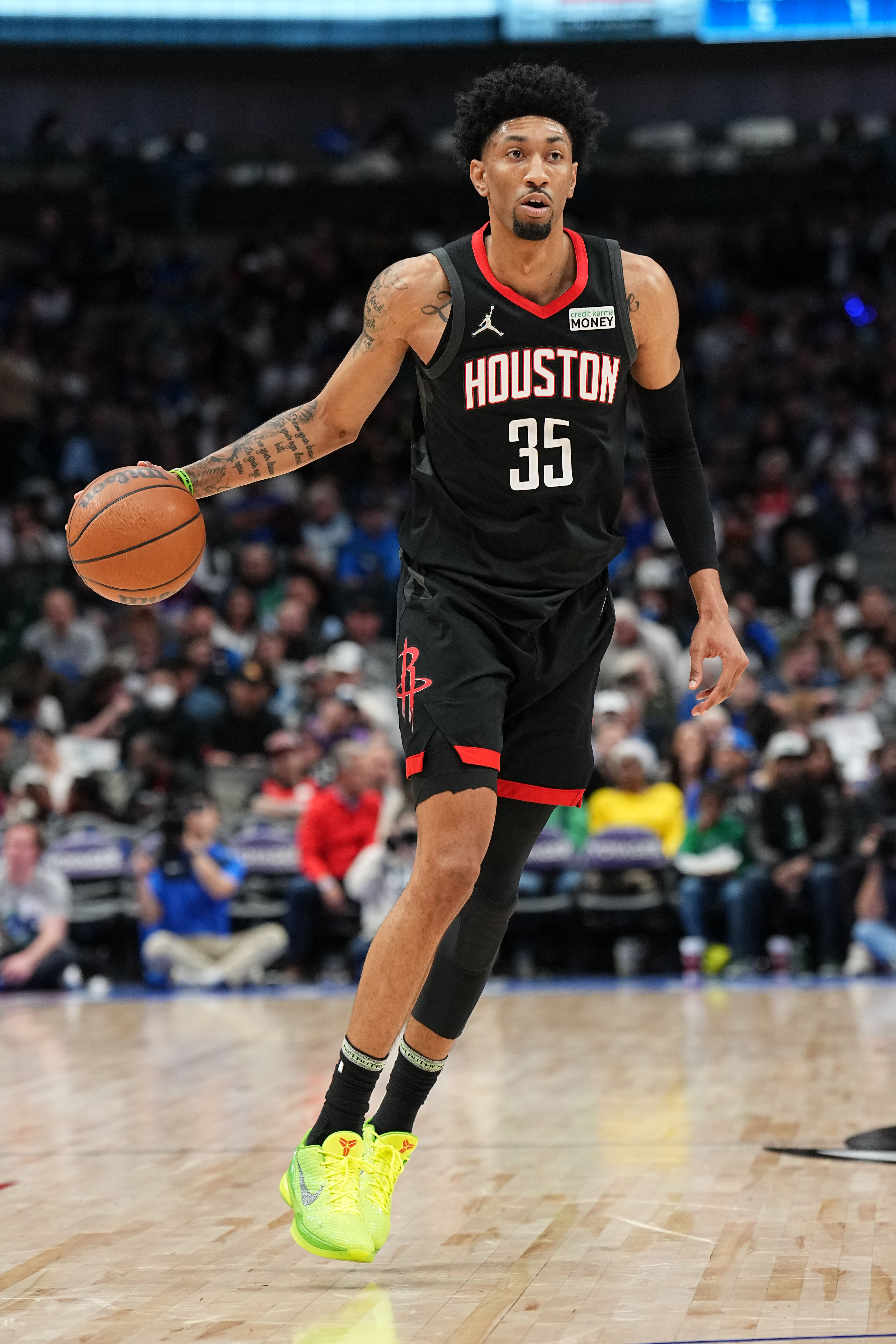 DALLAS, TX - MARCH 23: Christian Wood #35 of the Houston Rockets dribbles the ball during the game against the Dallas Mavericks on March 23, 2022 at the American Airlines Center in Dallas, Texas. NOTE TO USER: User expressly acknowledges and agrees that, by downloading and or using this photograph, User is consenting to the terms and conditions of the Getty Images License Agreement. Mandatory Copyright Notice: Copyright 2022 NBAE (Photo by Glenn James/NBAE via Getty Images) DALLAS, TX - MARCH 23: Christian Wood #35 of the Houston Rockets dribbles the ball during the game against the Dallas Mavericks on March 23, 2022 at the American Airlines Center in Dallas, Texas. NOTE TO USER: User expressly acknowledges and agrees that, by downloading and or using this photograph, User is consenting to the terms and conditions of the Getty Images License Agreement. Mandatory Copyright Notice: Copyright 2022 NBAE (Photo by Glenn James/NBAE via Getty Images)