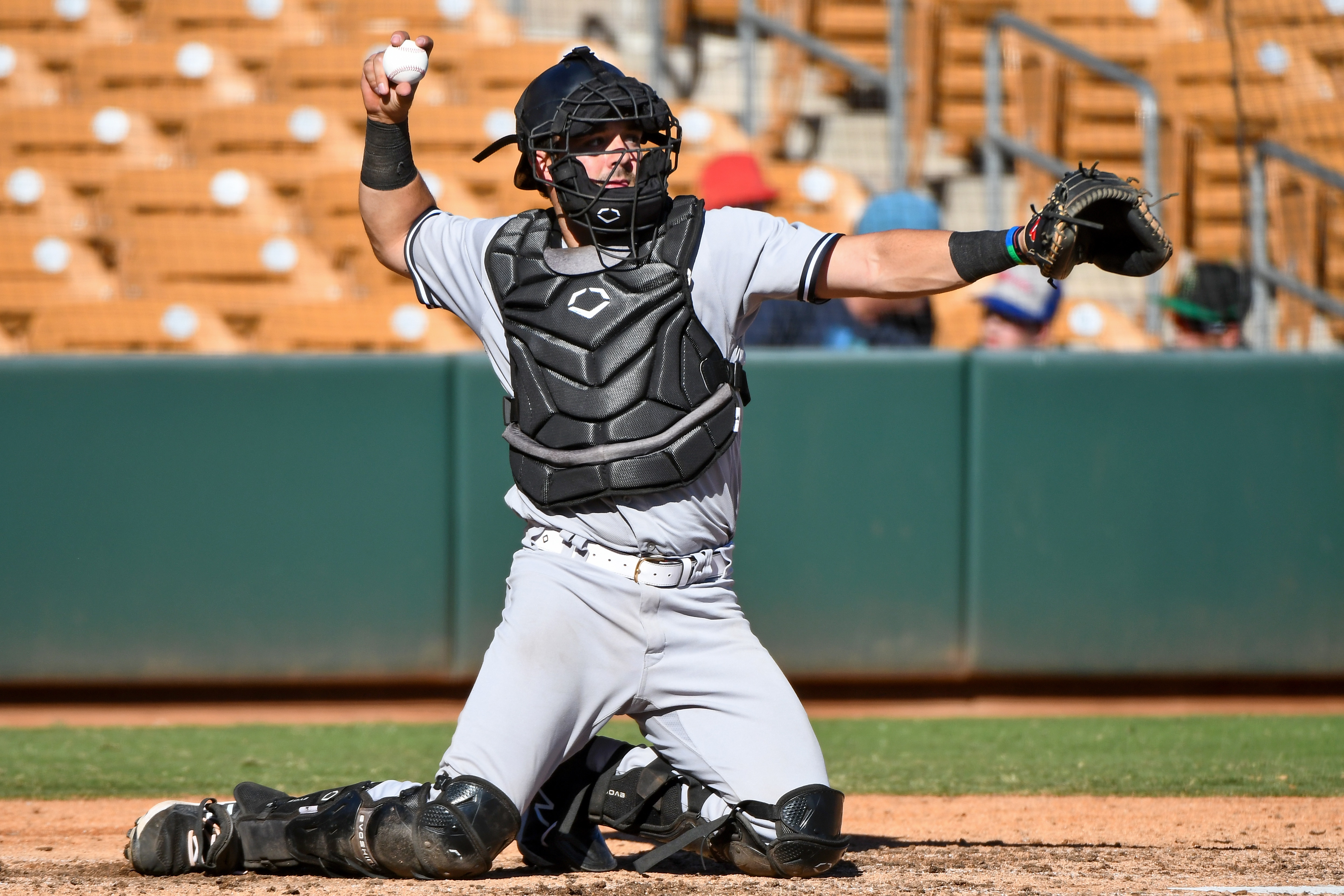 GLENDALE, AZ - NOVEMBER 11, 2021: Austin Wells #13 of the Surprise Saguaros throws to second base against the Glendale Desert Dogs at Camelback Ranch on November 11, 2021 in Glendale, Arizona. (Photo by Chris Bernacchi/Diamond Images via Getty Images)