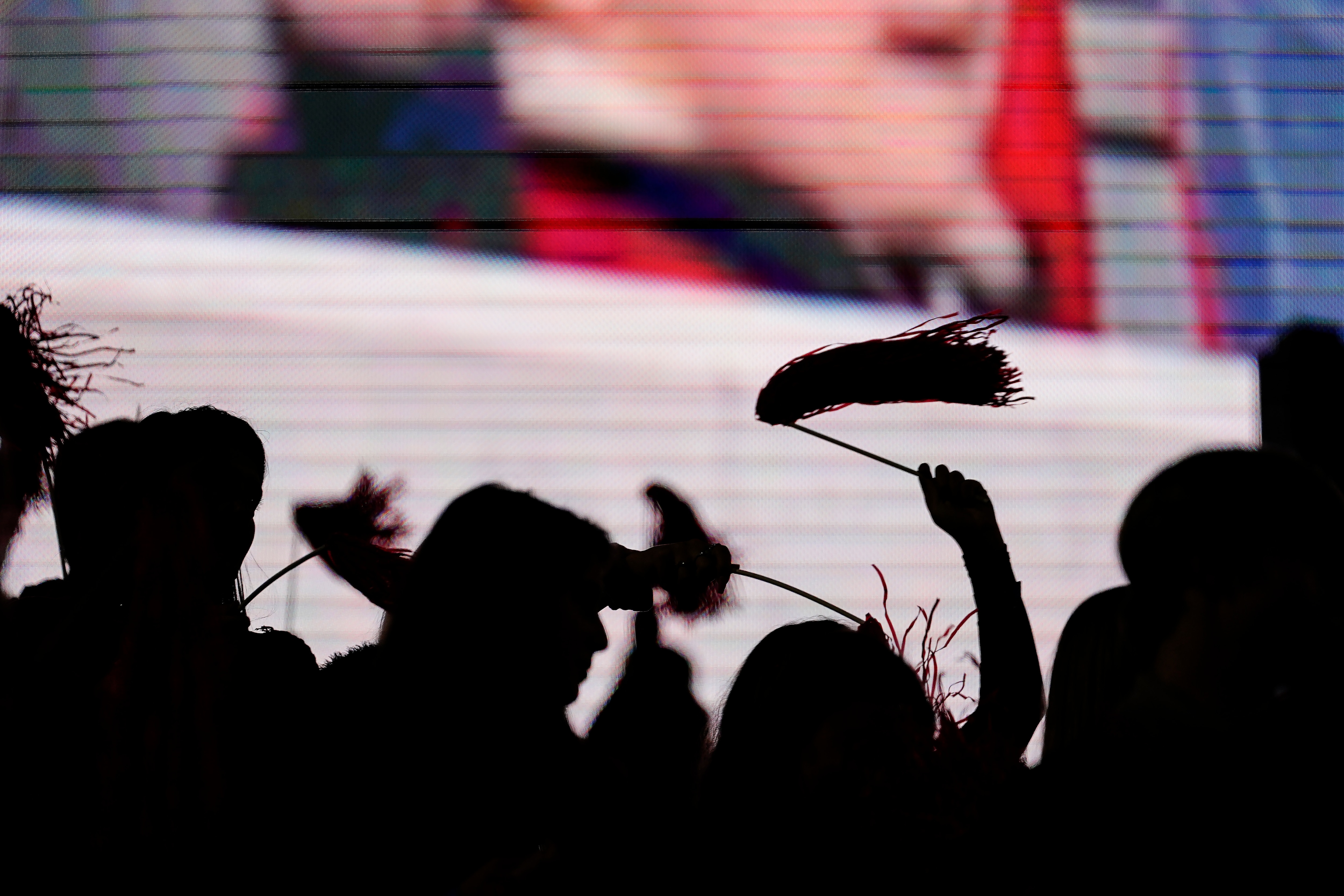 Fans shake their pom poms before an NCAA college football game with Georgia and Mississippi State, Saturday, Nov. 21, 2020, in Athens, Ga. (AP Photo/Brynn Anderson)