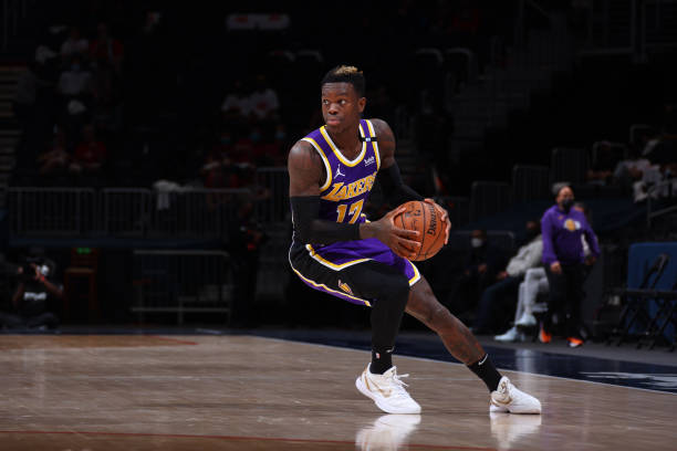 WASHINGTON, DC -  APRIL 28: Dennis Schroder #17 of the Los Angeles Lakers handles the ball during the game against the Washington Wizards on April 28, 2021 at Capital One Arena in Washington, DC. NOTE TO USER: User expressly acknowledges and agrees that, by downloading and or using this Photograph, user is consenting to the terms and conditions of the Getty Images License Agreement. Mandatory Copyright Notice: Copyright 2021 NBAE (Photo by Ned Dishman/NBAE via Getty Images)