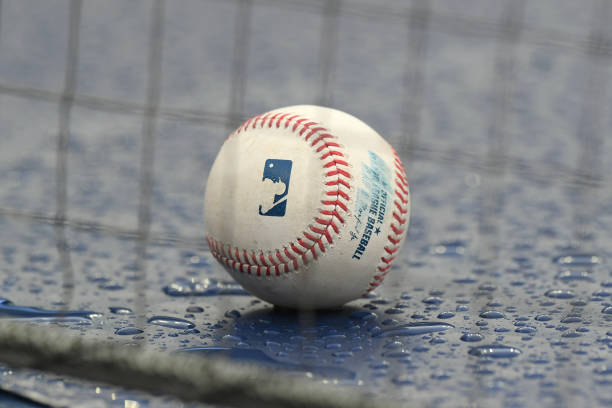 DETROIT, MI - AUGUST 02:  A detailed view of an official Major League baseball sitting on top of the dugout in the rain during game one of a doubleheader between the Cincinnati Reds and the Detroit Tigers at Comerica Park on August 2, 2020 in Detroit, Michigan. The Reds defeated the Tigers 4-3.  (Photo by Mark Cunningham/MLB Photos via Getty Images)