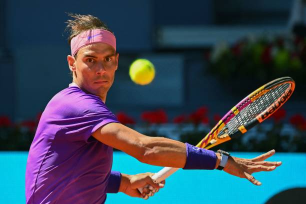 Spain's Rafael Nadal eyes the ball during his 2021 ATP Tour Madrid Open tennis tournament singles match against Australia's Alexei Popyrin at the Caja Magica in Madrid on May 6, 2021. (Photo by GABRIEL BOUYS / AFP) (Photo by GABRIEL BOUYS/AFP via Getty Images)