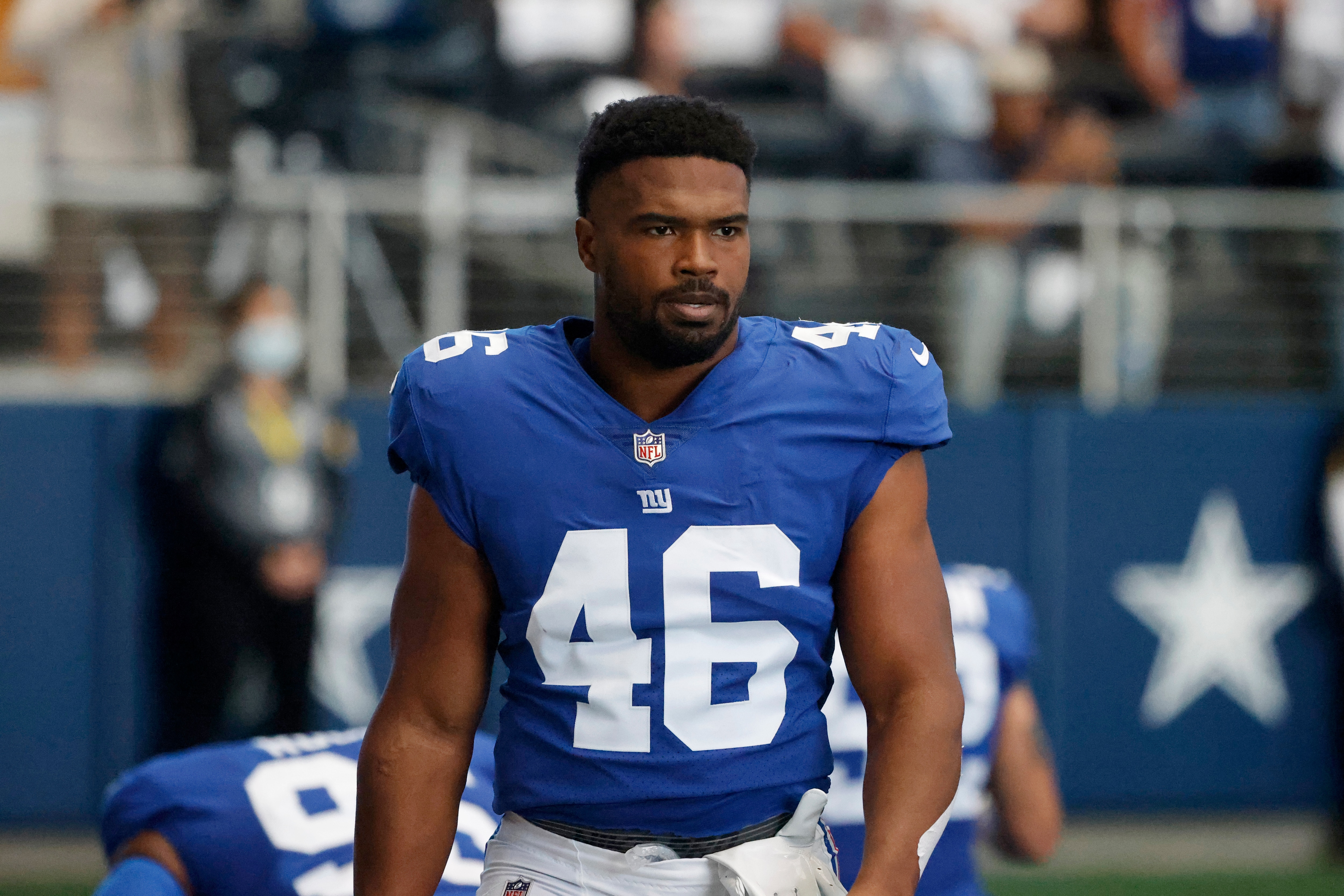 New York Giants linebacker Justin Hilliard (46) walks onto the field prior to playing the Dallas Cowboys during an NFL football game in Arlington, Texas, Sunday, Oct. 10, 2021. (AP Photo/Michael Ainsworth)