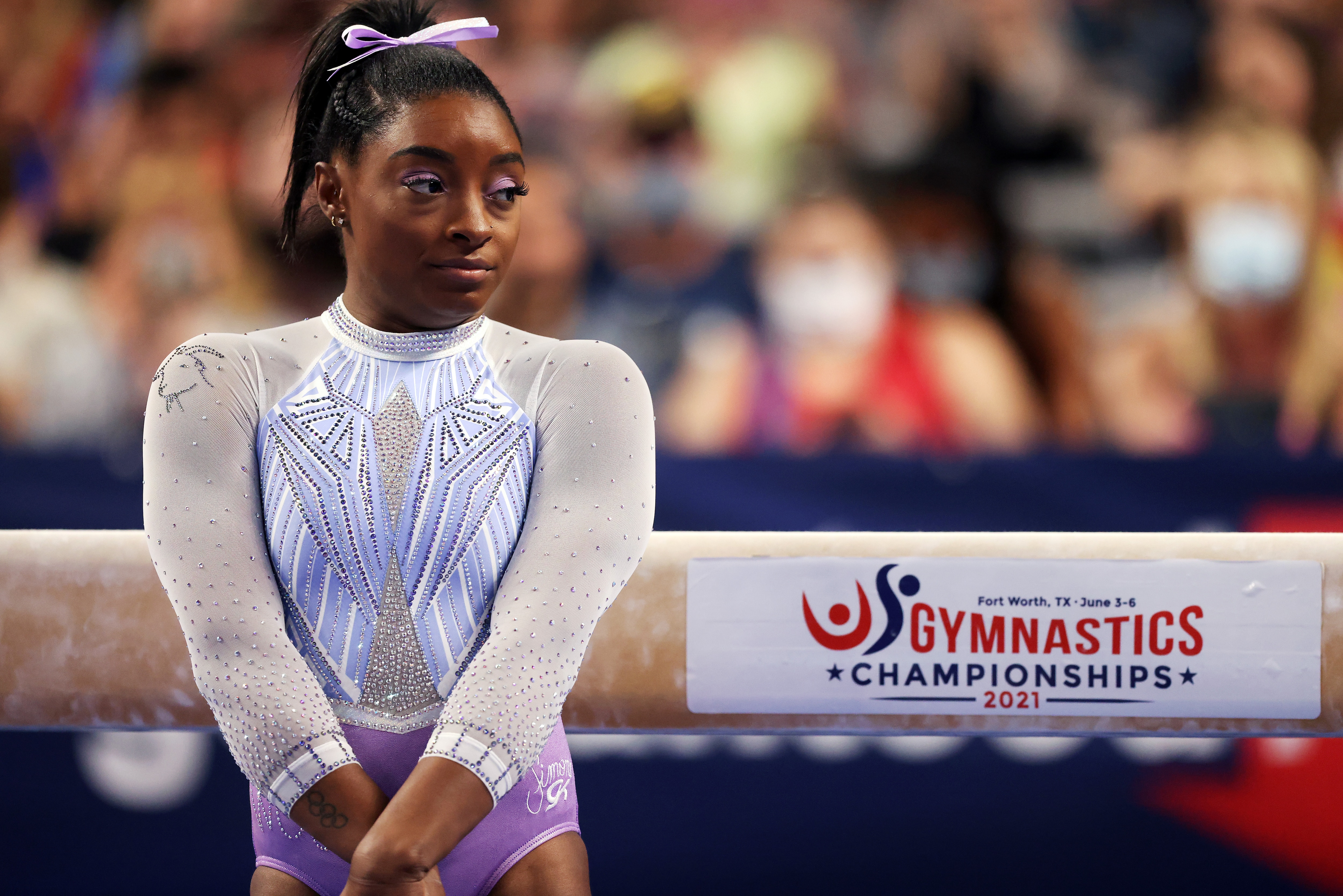 FORT WORTH, TEXAS - JUNE 04:  Simone Biles prepares to compete on the beam prior to the Senior Women's competition of the 2021 U.S. Gymnastics Championships at Dickies Arena on June 04, 2021 in Fort Worth, Texas. (Photo by Jamie Squire/Getty Images)