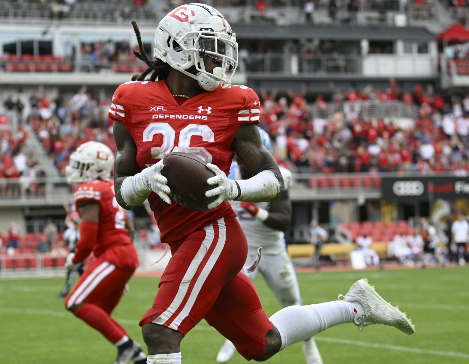 WASHINGTON, DC - APRIL 16: Defenders safety D.J. Swearinger (36) runs back a 3rd quarter interception for a touchdown during the DC Defenders defeat of the Arlington Renegades 28-26 in XFL football on April 16, 2023 at Audi Field in Washington, DC. (Photo by John McDonnell/The Washington Post via Getty Images)
