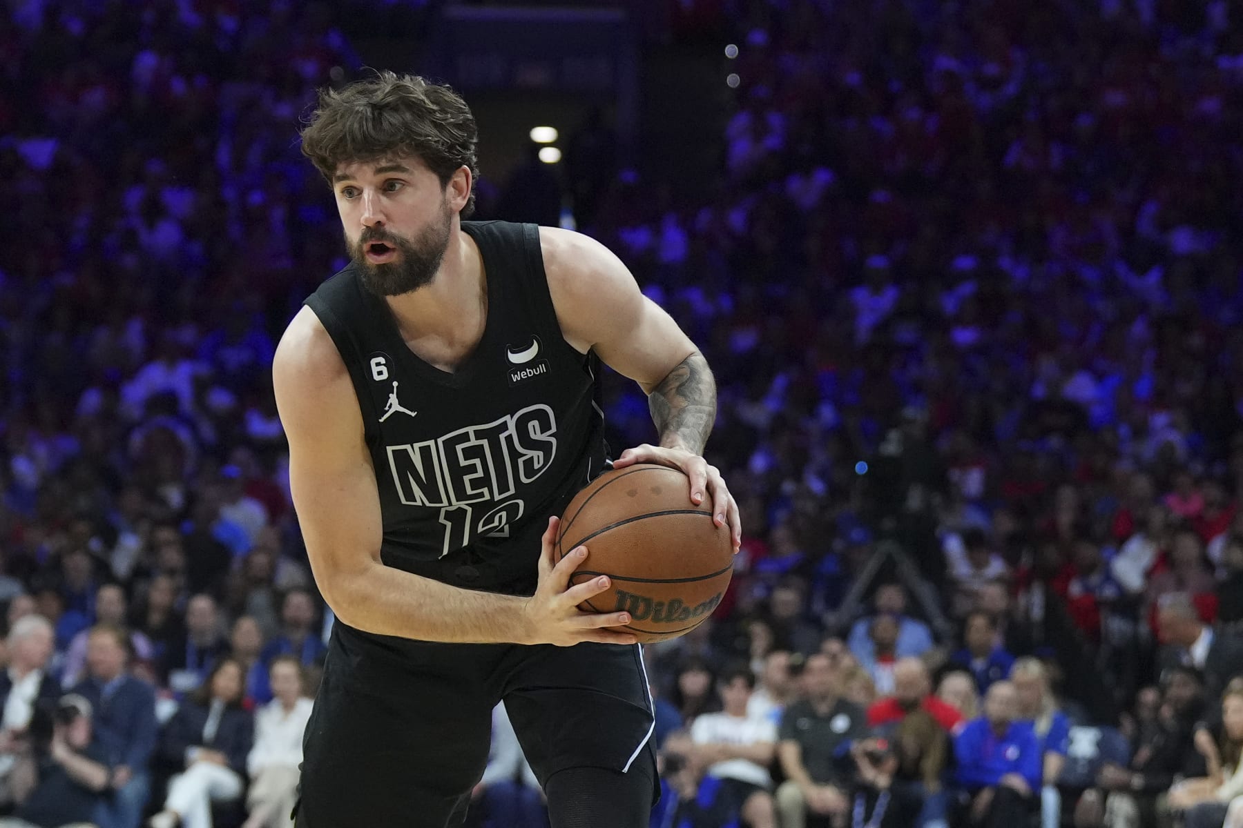 PHILADELPHIA, PA - APRIL 15: Joe Harris #12 of the Brooklyn Nets controls the ball against the Philadelphia 76ers during Game One of the Eastern Conference First Round Playoffs at the Wells Fargo Center on April 15, 2023 in Philadelphia, Pennsylvania. The 76ers defeated the Nets 121-101. NOTE TO USER: User expressly acknowledges and agrees that, by downloading and or using this photograph, User is consenting to the terms and conditions of the Getty Images License Agreement. (Photo by Mitchell Leff/Getty Images)