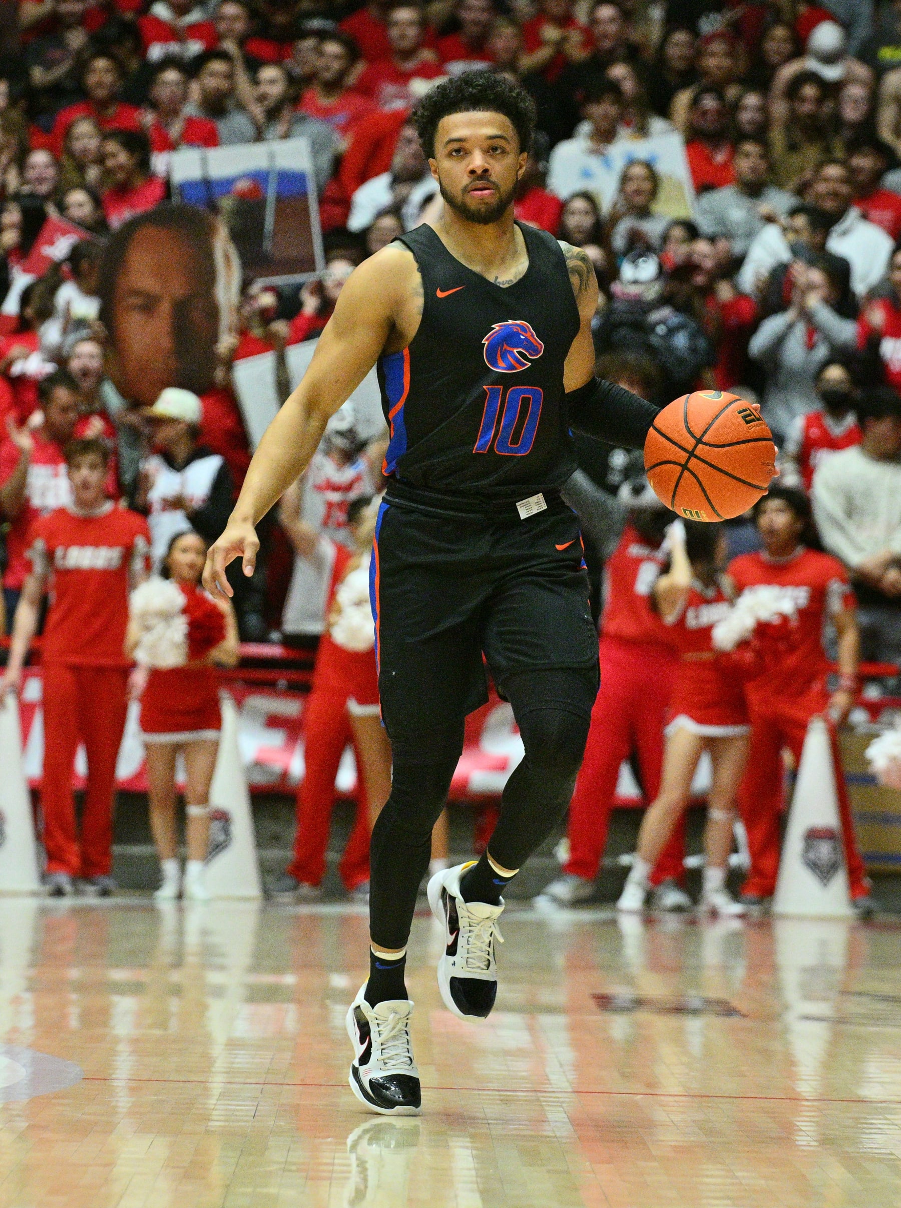 ALBUQUERQUE, NEW MEXICO - JANUARY 20: Marcus Shaver Jr. #10 of the Boise State Broncos dribbles against the New Mexico Lobos during the first half of their game at The Pit on January 20, 2023 in Albuquerque, New Mexico. (Photo by Sam Wasson/Getty Images)