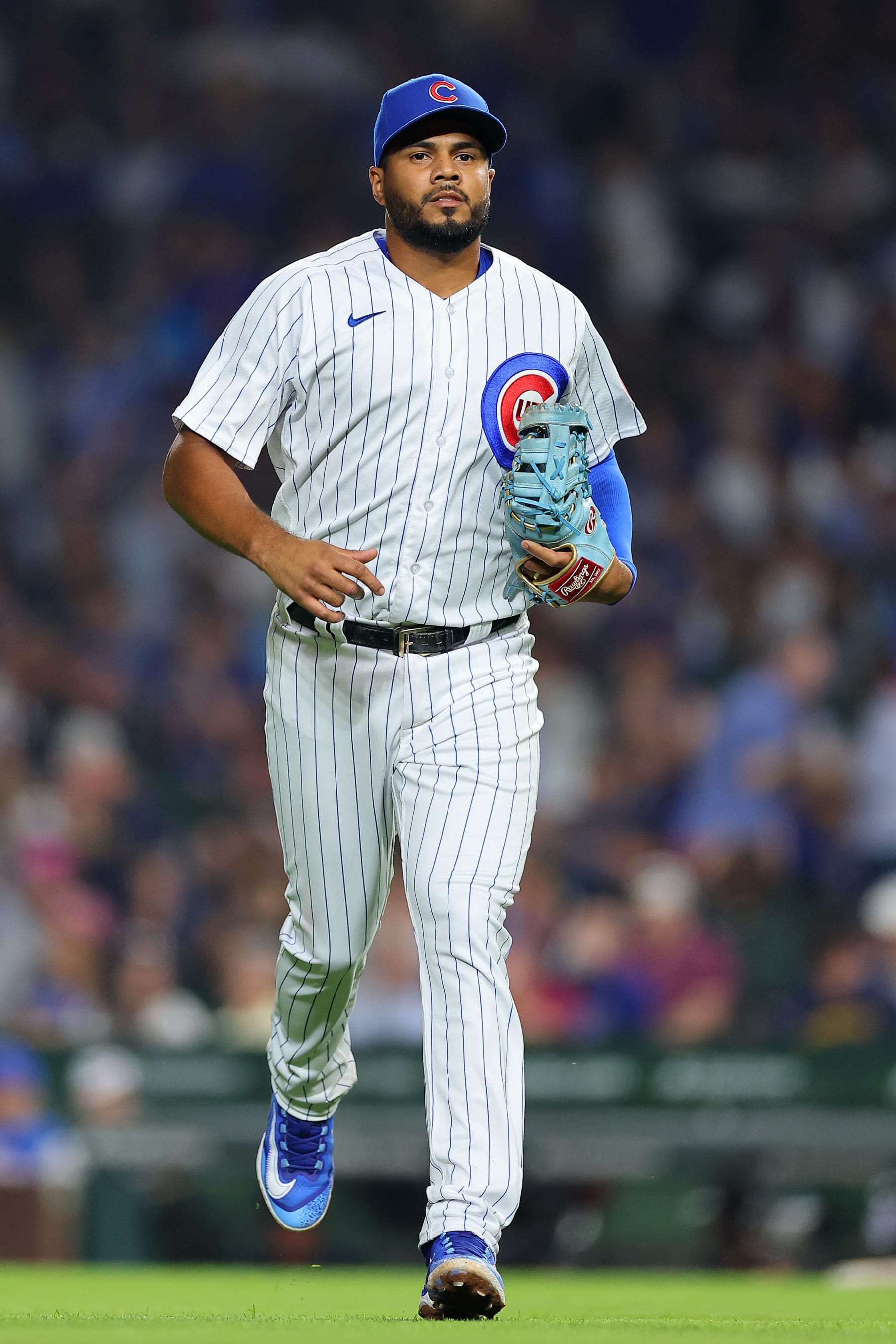 CHICAGO, ILLINOIS - AUGUST 28: Jeimer Candelario #9 of the Chicago Cubs in action against the Milwaukee Brewers at Wrigley Field on August 28, 2023 in Chicago, Illinois. (Photo by Michael Reaves/Getty Images)