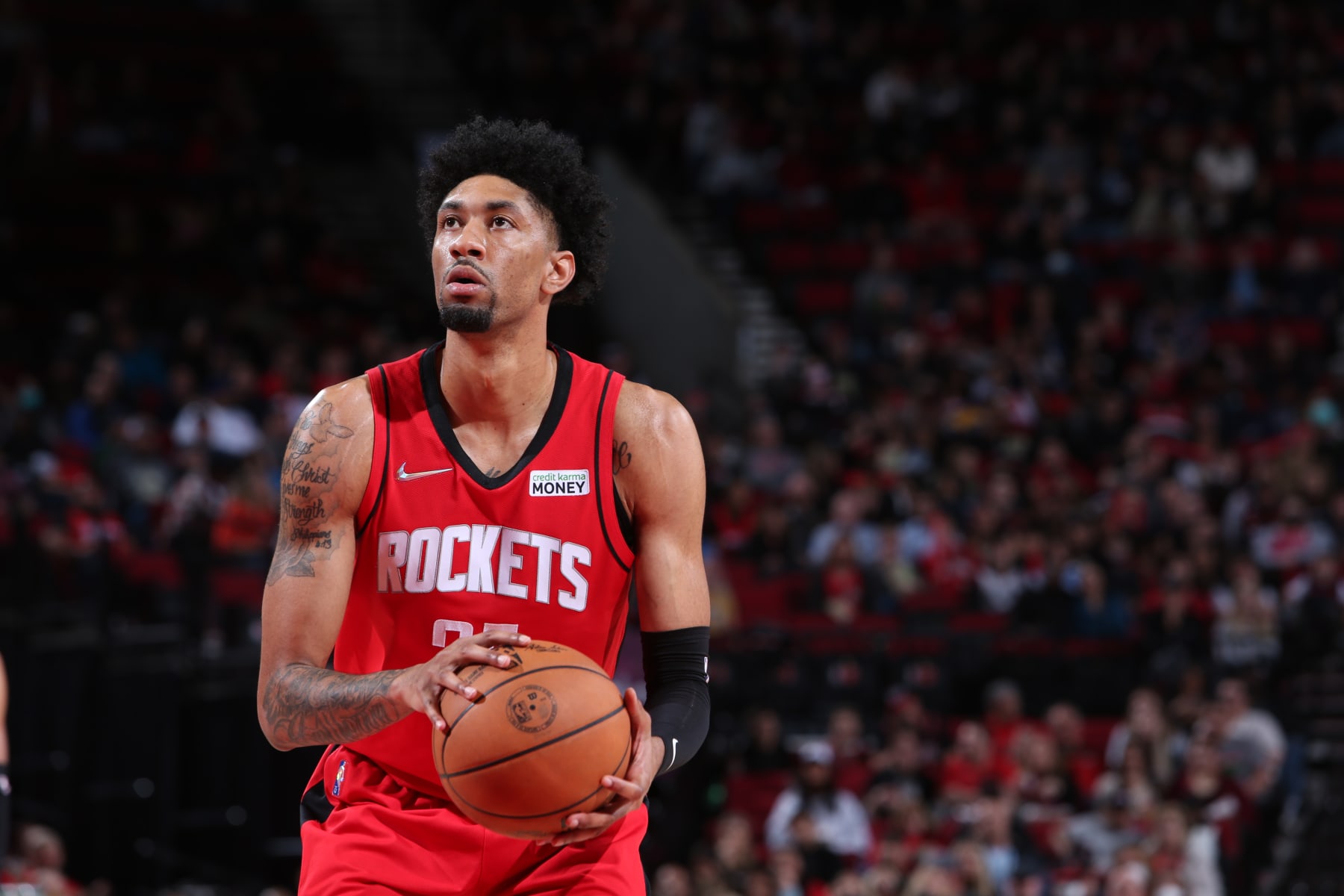 PORTLAND, OR - MARCH 26: Christian Wood #35 of the Houston Rockets shoots a free throw during the game against the Portland Trail Blazers on March 26, 2022 at the Moda Center Arena in Portland, Oregon. NOTE TO USER: User expressly acknowledges and agrees that, by downloading and or using this photograph, user is consenting to the terms and conditions of the Getty Images License Agreement. Mandatory Copyright Notice: Copyright 2022 NBAE (Photo by Sam Forencich/NBAE via Getty Images)
