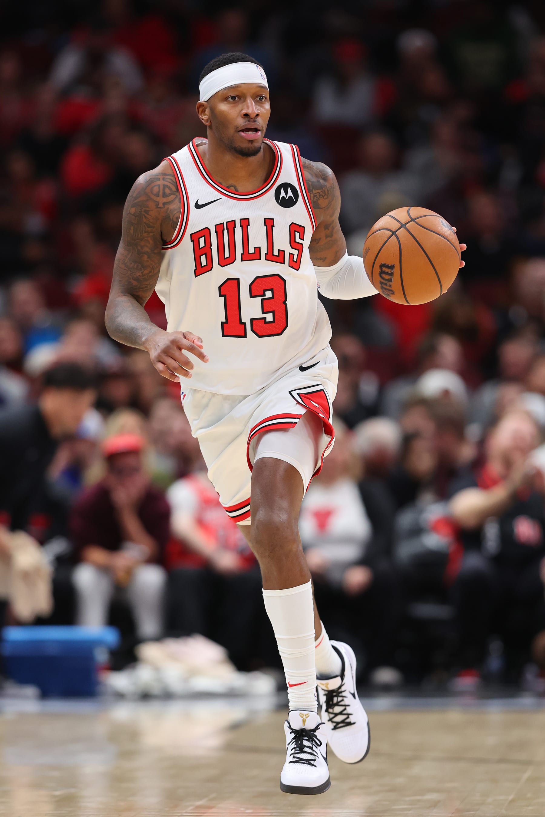 CHICAGO, ILLINOIS - NOVEMBER 06: Torrey Craig #13 of the Chicago Bulls dribbles up the court against the Utah Jazz during the first half at the United Center on November 06, 2023 in Chicago, Illinois. NOTE TO USER: User expressly acknowledges and agrees that, by downloading and or using this photograph, User is consenting to the terms and conditions of the Getty Images License Agreement. (Photo by Michael Reaves/Getty Images)