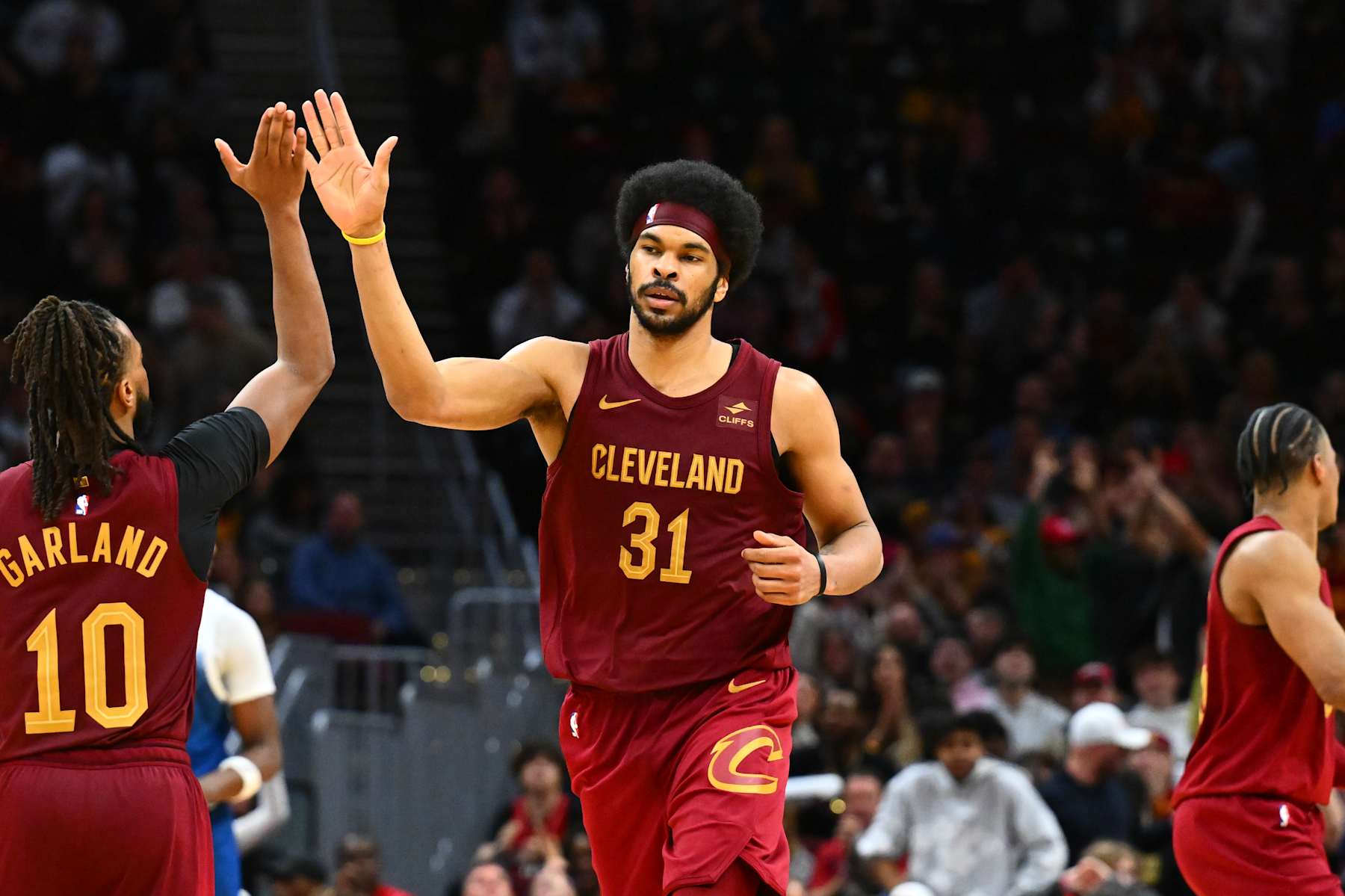CLEVELAND, OHIO - MARCH 08: Darius Garland #10 celebrates with Jarrett Allen #31 of the Cleveland Cavaliers after Allen scored during overtime against the Minnesota Timberwolves at Rocket Mortgage Fieldhouse on March 08, 2024 in Cleveland, Ohio. The Cavaliers defeated the Timberwolves 113-104 in overtime. NOTE TO USER: User expressly acknowledges and agrees that, by downloading and or using this photograph, User is consenting to the terms and conditions of the Getty Images License Agreement. (Photo by Jason Miller/Getty Images)
