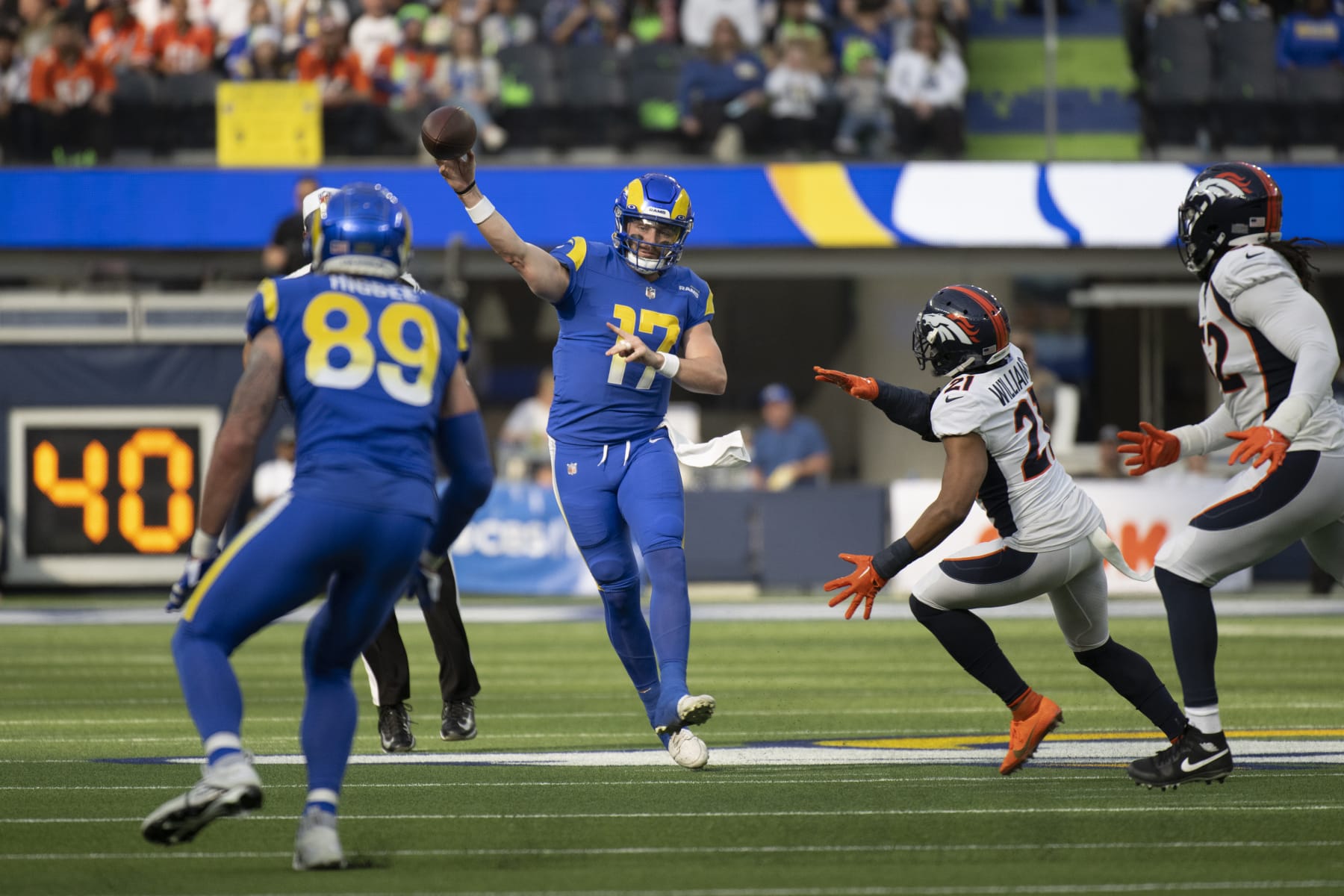 Los Angeles Rams quarterback Baker Mayfield (17) throws a pass to tight end Tyler Higbee (89) during an NFL football game against the Denver Broncos, Sunday, Dec. 25, 2022, in Inglewood, Calif. (AP Photo/Kyusung Gong)