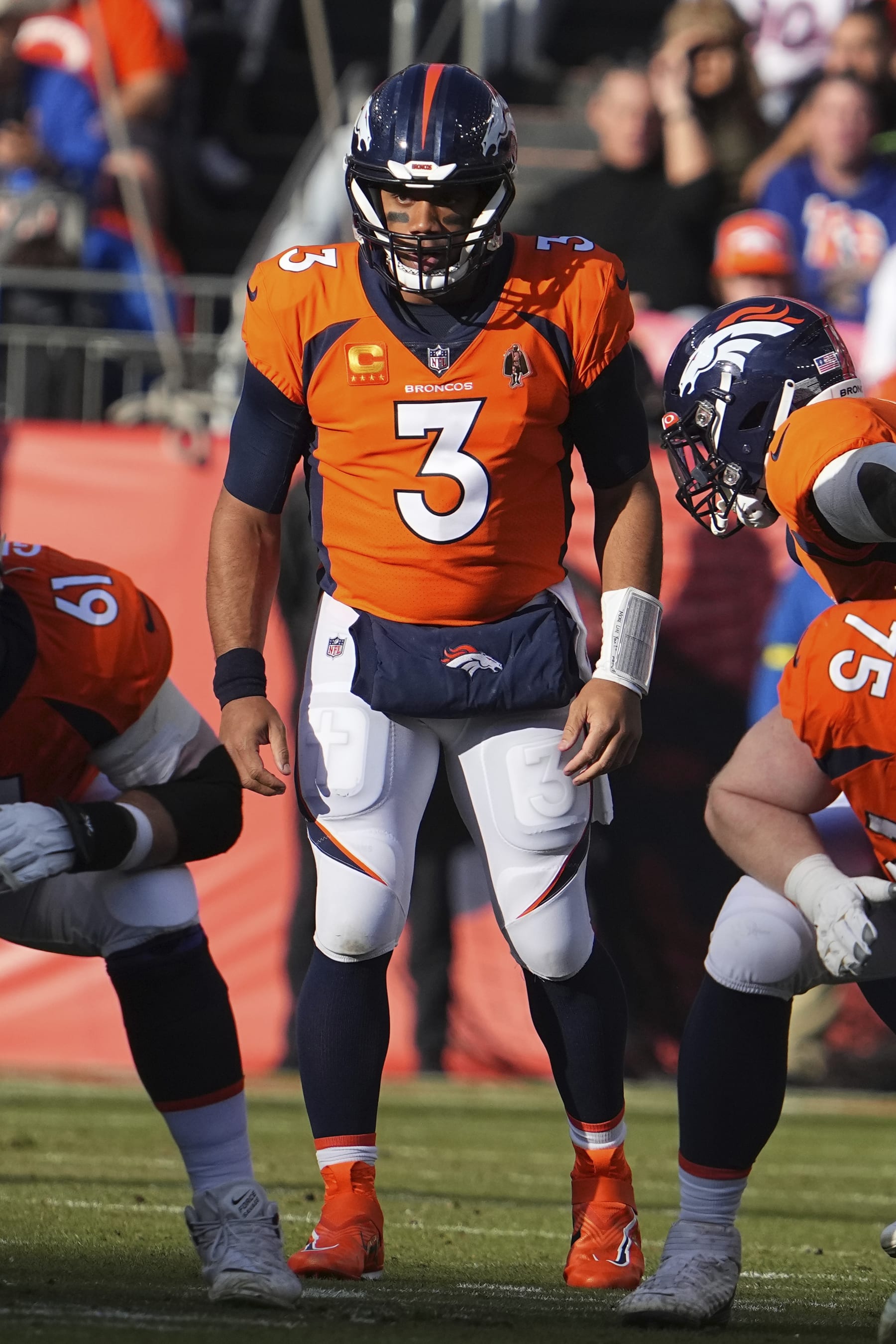 Denver Broncos quarterback Russell Wilson (3) plays against the Los Angeles Chargers of an NFL football game Sunday, January 8, 2023, in Denver. (AP Photo/Bart Young)