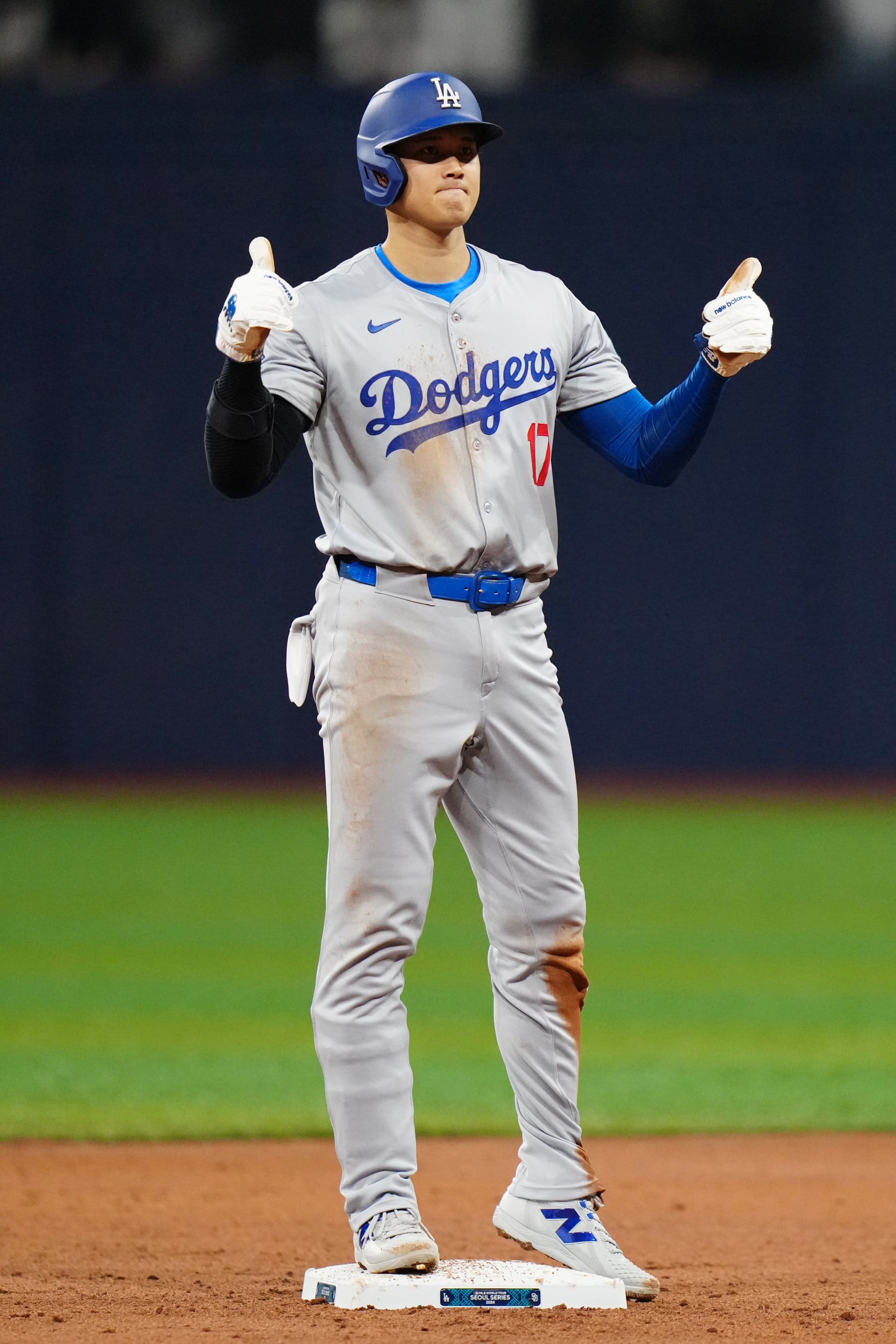 SEOUL, SOUTH KOREA - MARCH 20:  Shohei Ohtani #17 of the Los Angeles Dodgers celebrates after stealing second base in the third inning during the 2024 Seoul Series game between the Los Angeles Dodgers and the San Diego Padres at Gocheok Sky Dome on Wednesday, March 20, 2024 in Seoul, California. (Photo by Daniel Shirey/MLB Photos via Getty Images)