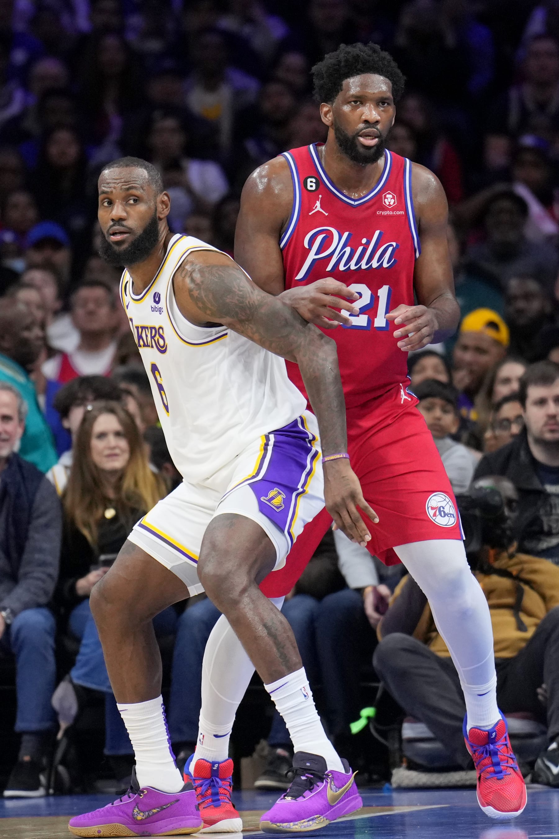 PHILADELPHIA, PA - DECEMBER 9: LeBron James #6 of the Los Angeles Lakers and Joel Embiid #21 of the Philadelphia 76ers look on during the game on December 9, 2022 at the Wells Fargo Center in Philadelphia, Pennsylvania NOTE TO USER: User expressly acknowledges and agrees that, by downloading and/or using this Photograph, user is consenting to the terms and conditions of the Getty Images License Agreement. Mandatory Copyright Notice: Copyright 2022 NBAE (Photo by Jesse D. Garrabrant/NBAE via Getty Images)
