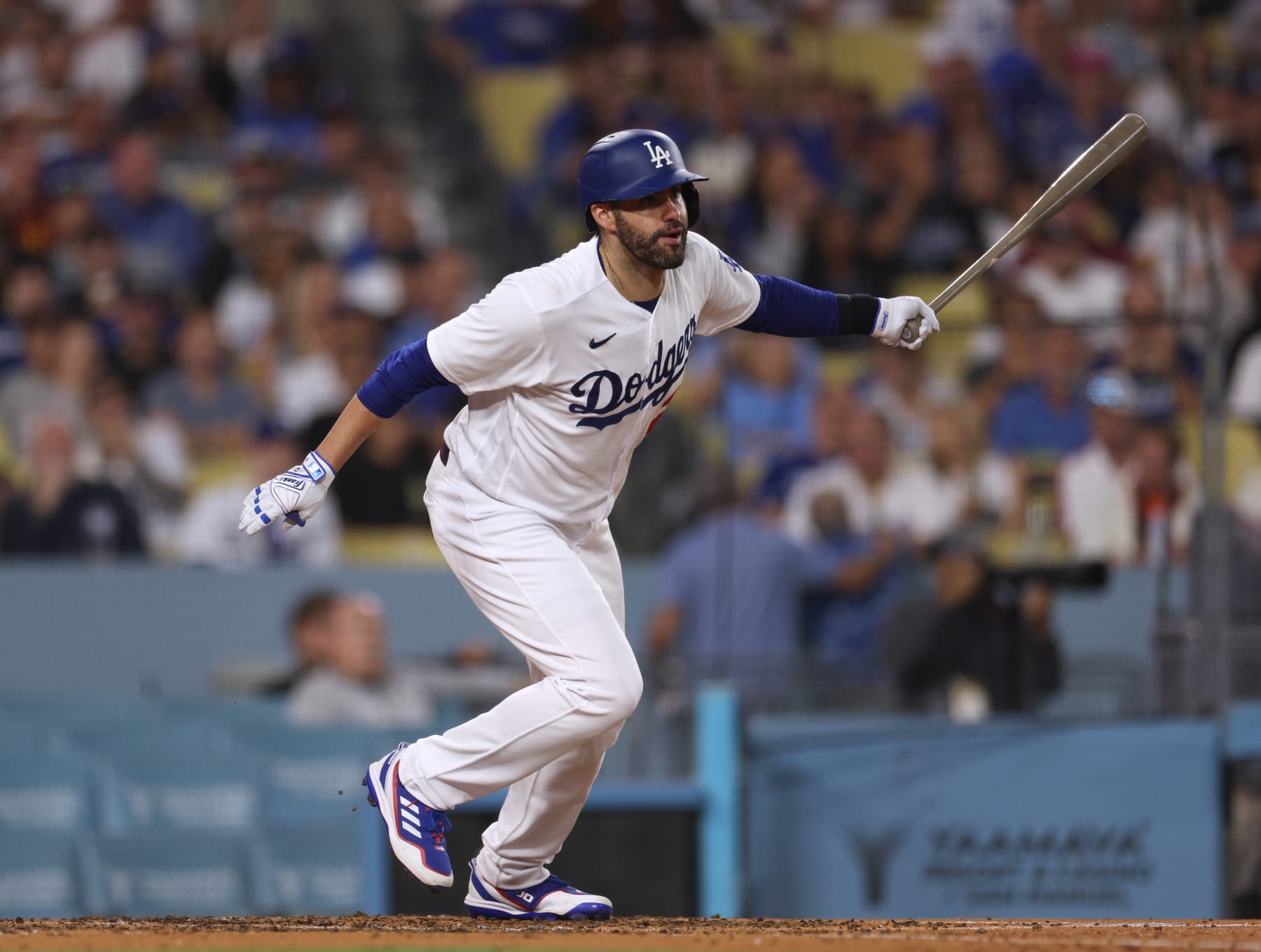 LOS ANGELES, CALIFORNIA - SEPTEMBER 23: J.D. Martinez #28 of the Los Angeles Dodgers hits a two run double, to take a 3-0 lead over the San Francisco Giants, during the third inning in a 7-0 win at Dodger Stadium on September 23, 2023 in Los Angeles, California. (Photo by Harry How/Getty Images)