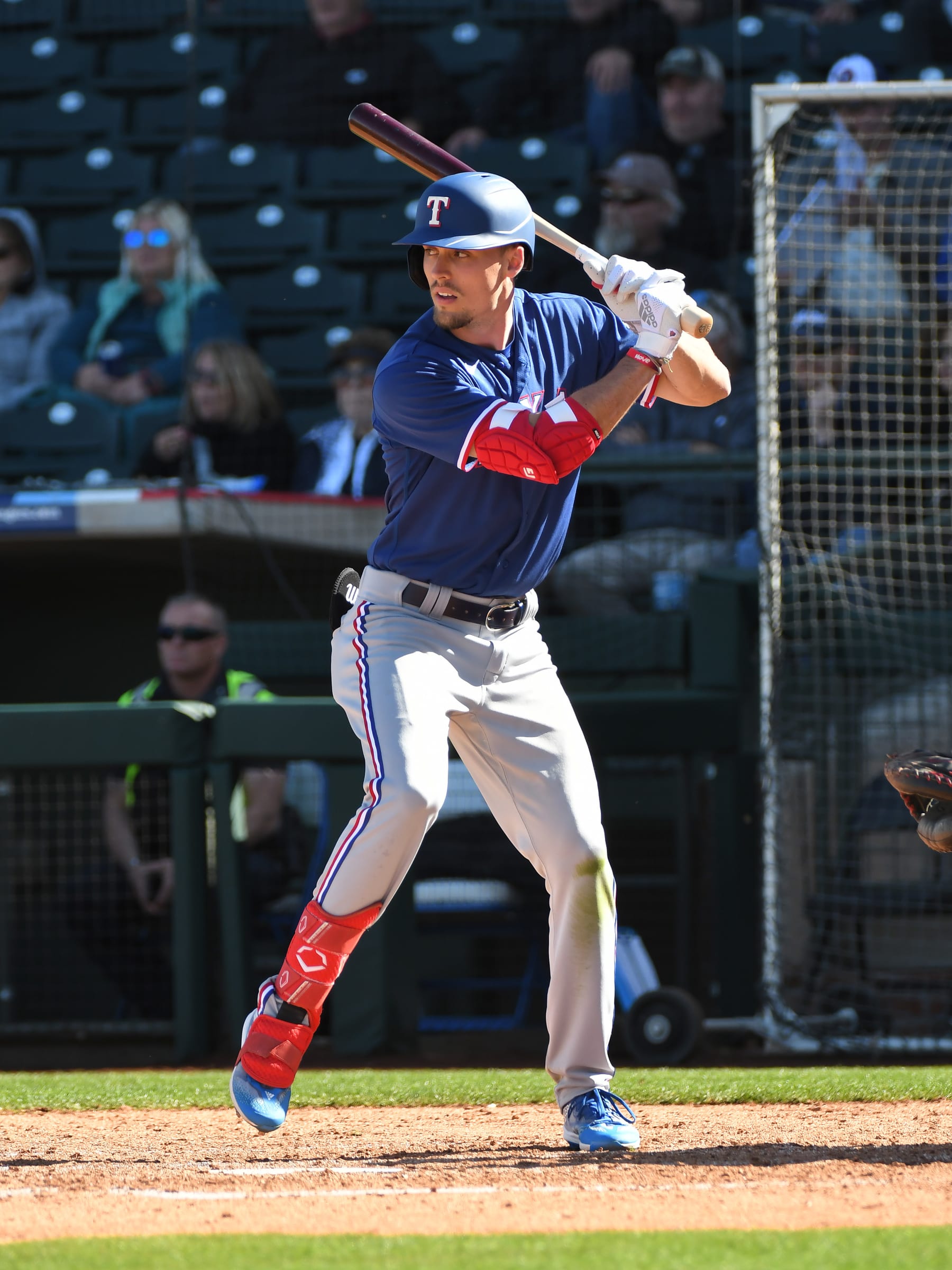 SURPRISE, ARIZONA - FEBRUARY 24, 2023: Evan Carter #87 of the Texas Rangers bats during the seventh inning of a spring training game against the Kansas City Royals at Surprise Stadium on February 24, 2023 in Surprise, Arizona. (Photo by David Durochik/Diamond Images via Getty Images)