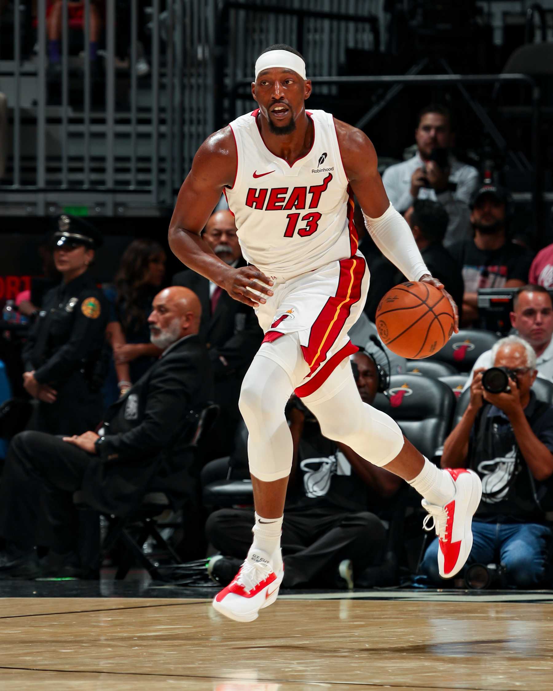 MIAMI, FL - OCTOBER 15: Bam Adebayo #13 of the Miami Heat drives to the basket during the game on October 15, 2024 at Kaseya Center in Miami, Florida. NOTE TO USER: User expressly acknowledges and agrees that, by downloading and or using this Photograph, user is consenting to the terms and conditions of the Getty Images License Agreement. Mandatory Copyright Notice: Copyright 2024 NBAE (Photo by Issac Baldizon/NBAE via Getty Images)