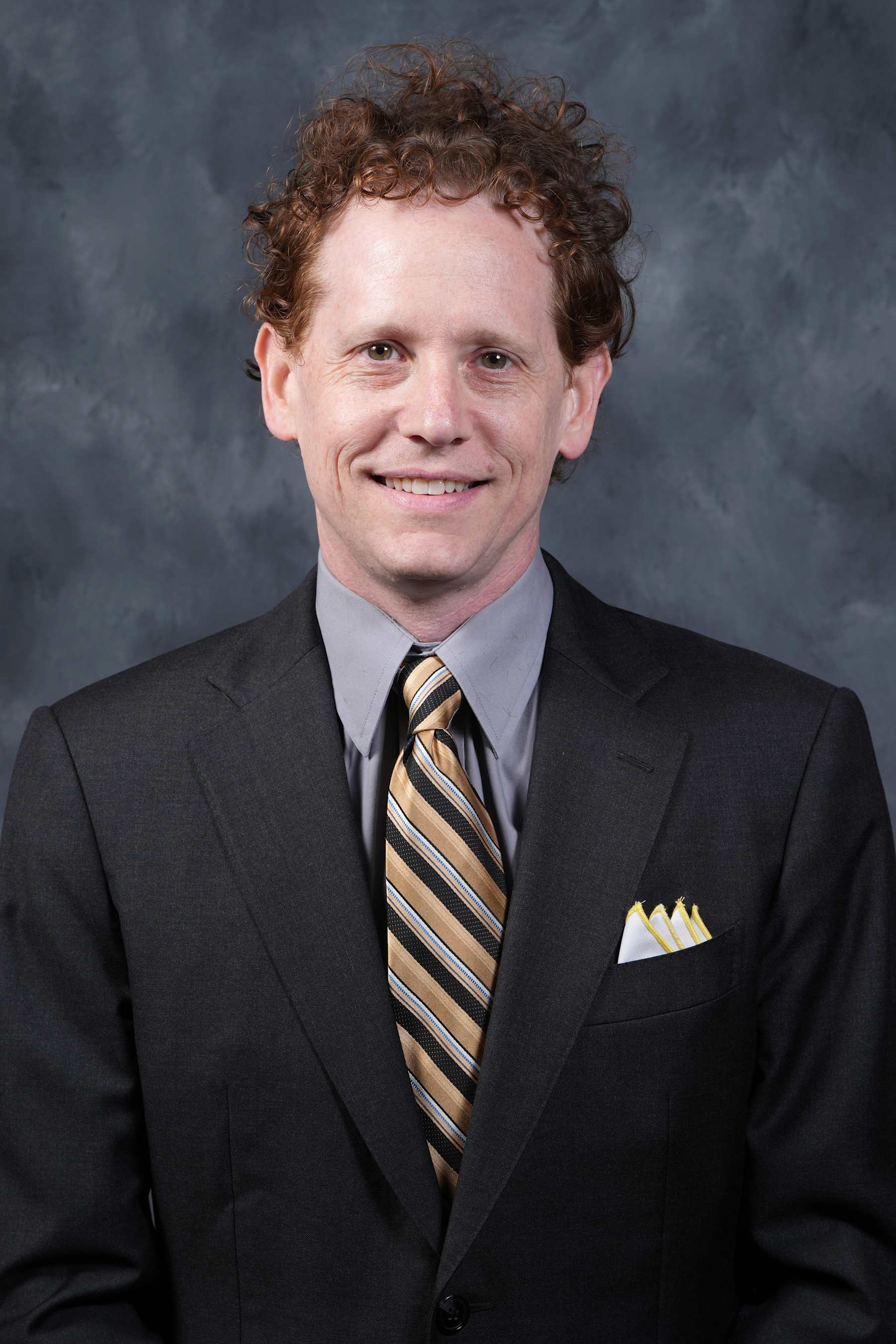 RALEIGH, NORTH CAROLINA - OCTOBER 06:  Assistant general manager Eric Tulsky of the Carolina Hurricanes poses for his official headshots for the 2023-2024 season at PNC Arena on October 6, 2023 in Raleigh, North Carolina. (Photo by Josh Lavallee/NHLI via Getty Images)