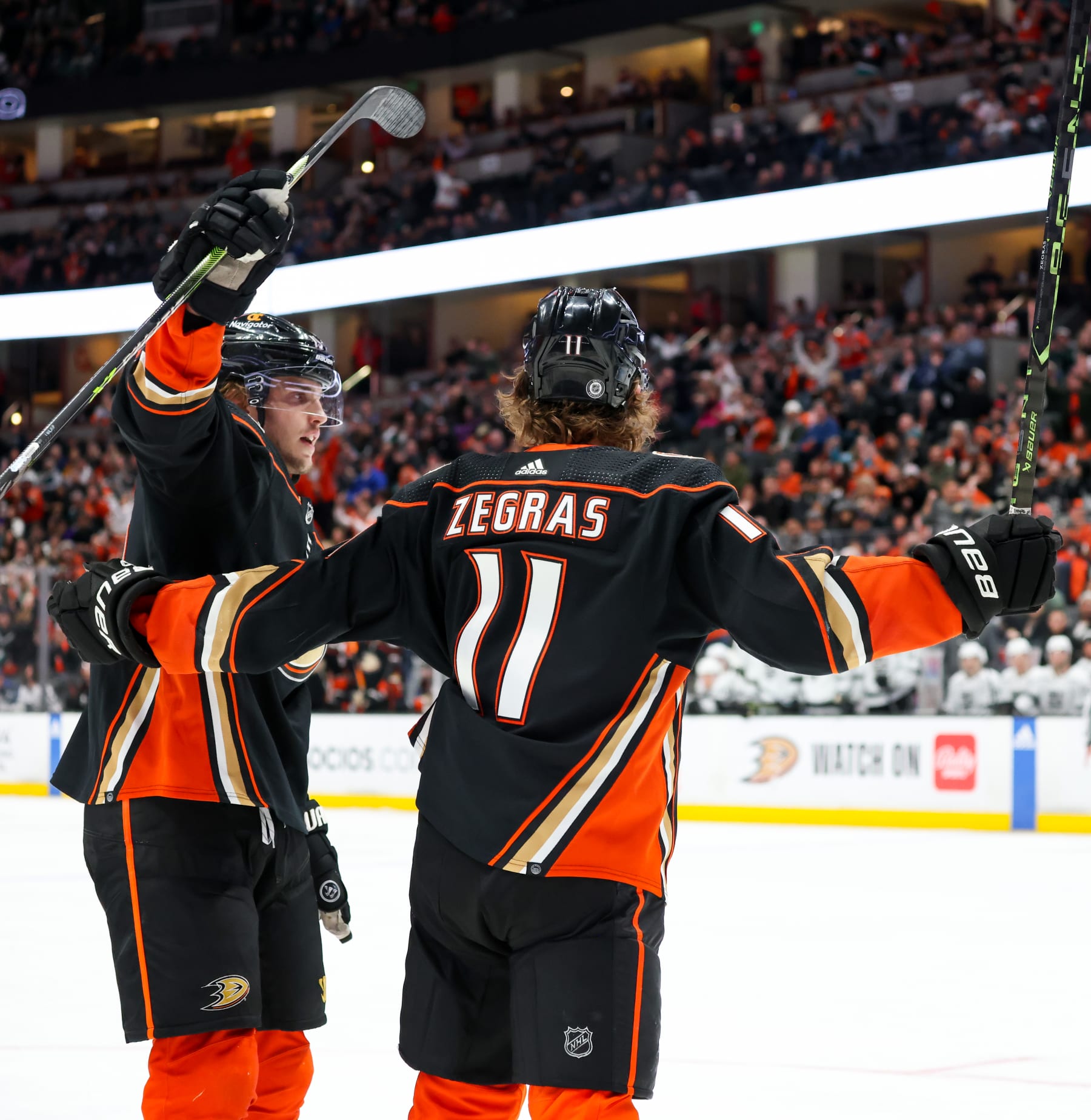 ANAHEIM, CA - APRIL 13:  Trevor Zegras #11 of the Anaheim Ducks celebrates his goal with teammates during the third period against the Los Angeles Kings at Honda Center on April 13, 2023 in Anaheim, California. (Photo by Debora Robinson/NHLI via Getty Images)