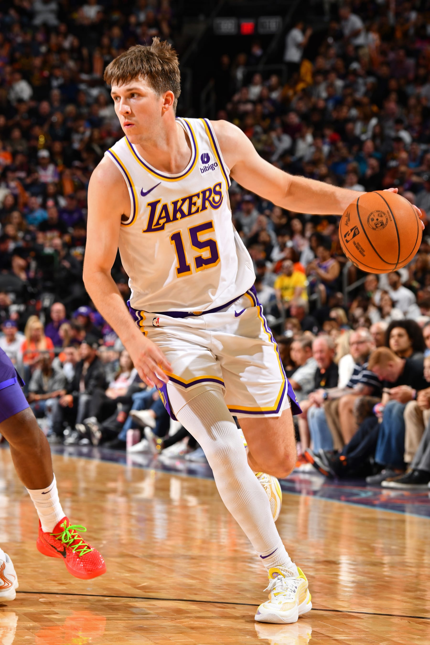 PHOENIX, AZ - FEBRUARY 25: Austin Reaves #15 of the Los Angeles Lakers looks on during the game against the Phoenix Suns on February 25, 2024 at Footprint Center in Phoenix, Arizona. NOTE TO USER: User expressly acknowledges and agrees that, by downloading and or using this photograph, user is consenting to the terms and conditions of the Getty Images License Agreement. Mandatory Copyright Notice: Copyright 2024 NBAE (Photo by Barry Gossage/NBAE via Getty Images)