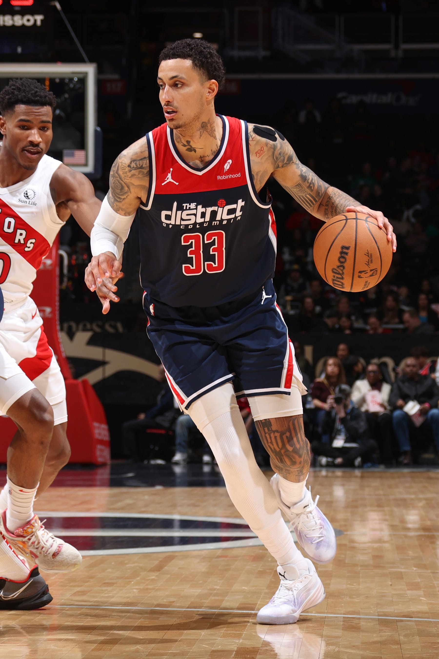 WASHINGTON, DC -  MARCH 23: Kyle Kuzma #33 of the Washington Wizards goes to the basket during the game on March 23, 2024 at Capital One Arena in Washington, DC. NOTE TO USER: User expressly acknowledges and agrees that, by downloading and or using this Photograph, user is consenting to the terms and conditions of the Getty Images License Agreement. Mandatory Copyright Notice: Copyright 2024 NBAE (Photo by Stephen Gosling/NBAE via Getty Images)