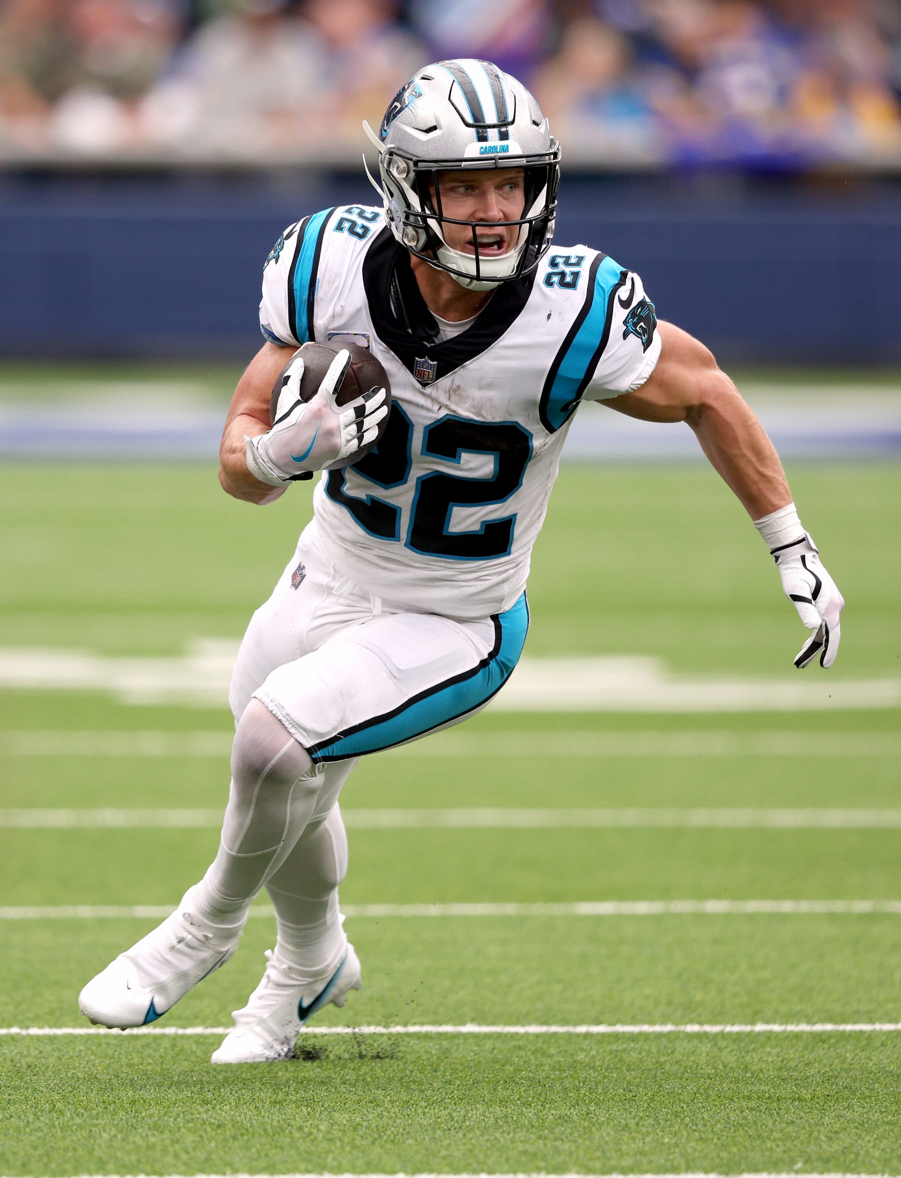 INGLEWOOD, CALIFORNIA - OCTOBER 16: Christian McCaffrey #22 of the Carolina Panthers runs after his catch during a 24-10 loss to the Los Angeles Rams at SoFi Stadium on October 16, 2022 in Inglewood, California. (Photo by Harry How/Getty Images)