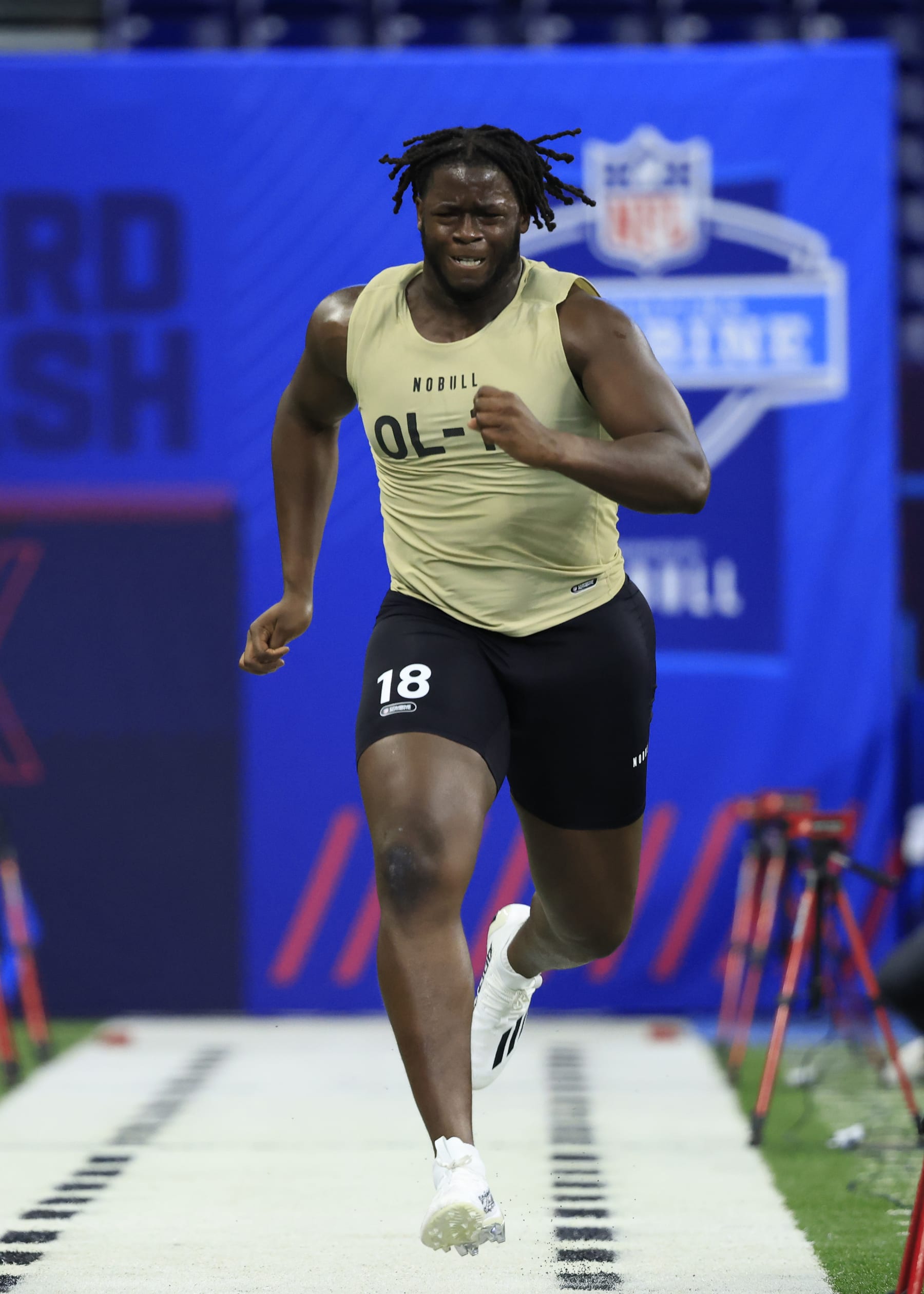 INDIANAPOLIS, INDIANA - MARCH 03: Olu Fashanu #OL18 of the Penn State  participates in the 40 yard dash during the NFL Combine at Lucas Oil Stadium on March 03, 2024 in Indianapolis, Indiana. (Photo by Justin Casterline/Getty Images)